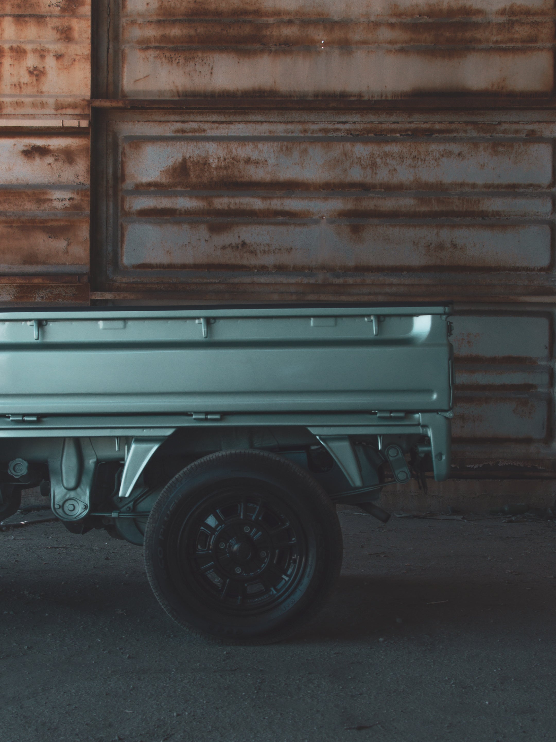 1994 Subaru Sambar, classic kei truck symbolizing Japanese engineering and cultural resilience.