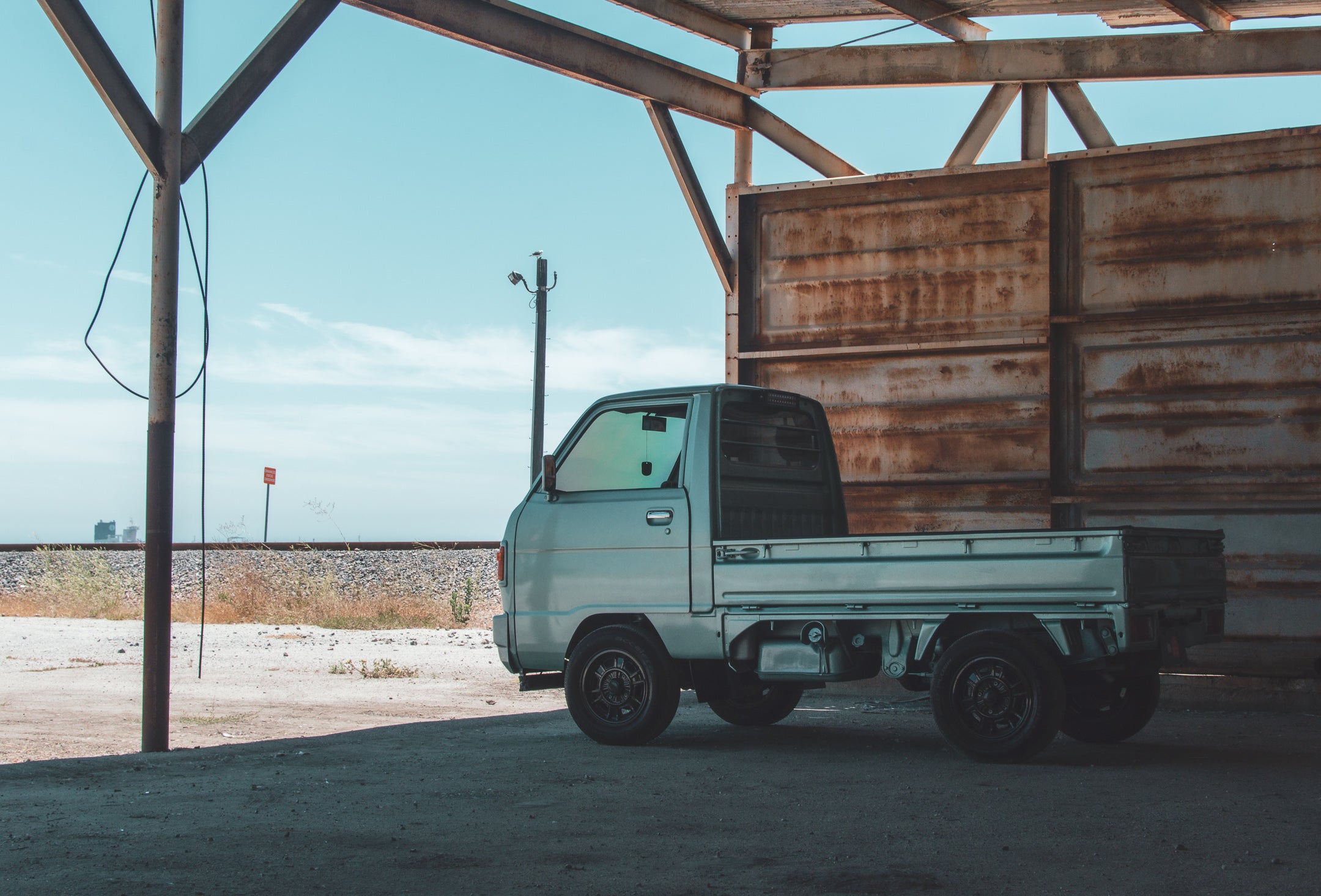 Kei truck in Illinois warehouse showcasing compact design and efficiency.