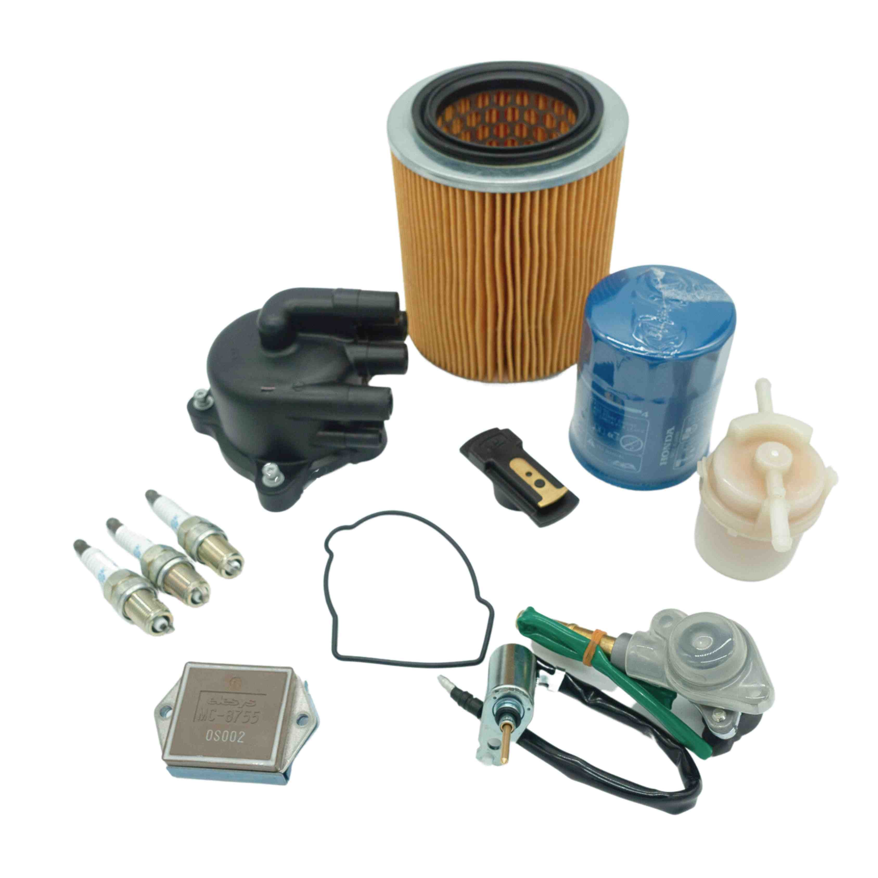 Complete Honda Acty Tune-Up Kit featuring OEM spark plugs, air filter, oil filter, fuel filter, ignition coil, distributor cap, and module for HA3 & HA4 models, 1990-1999 – enhance your mini truck's efficiency with quality parts from Oiwa Garage.