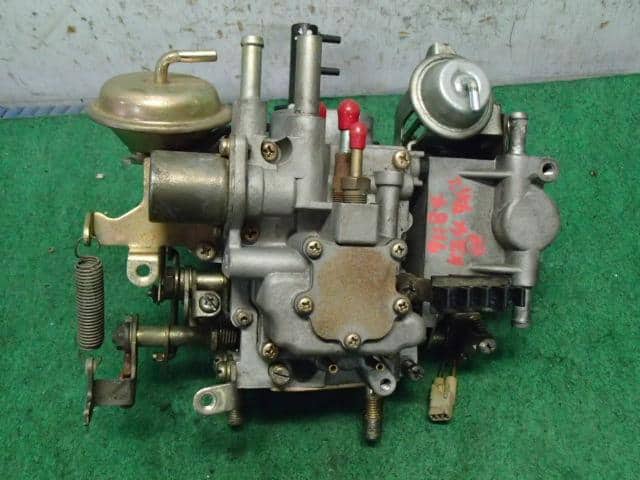 Detailed view of Subaru Sambar carburetor for KS3, KS4 models (1990-1998) showcasing the complete assembly with air and fuel components.