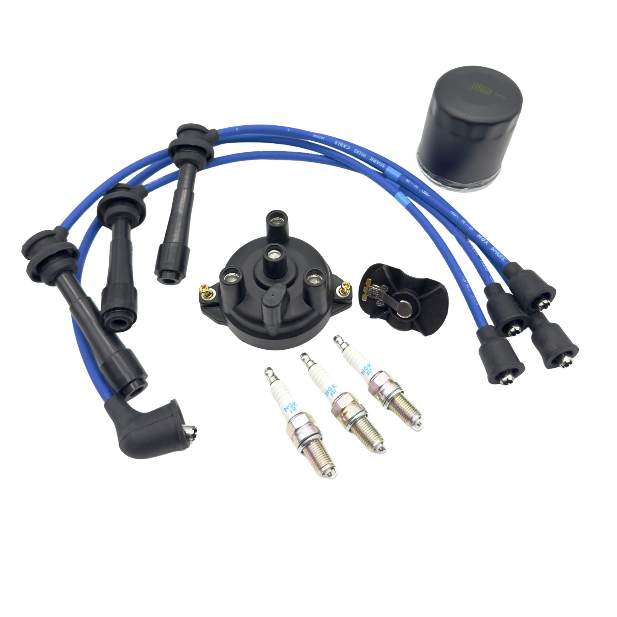 Ten piece ignition kit for Suzuki Carry DC51T and DD51T 1991 to 1999, featuring distributor cap, rotor, three NGK spark plugs, blue spark plug wires, and oil filter arranged on a white background for a complete tune up.