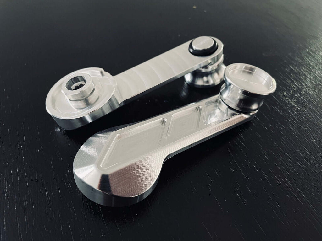 Premium machined window cranks with mirrored LT and RT design, crafted from high-quality 6061 aluminum, compatible with Honda Acty HA1-HA4, CRX, and Civic models.
