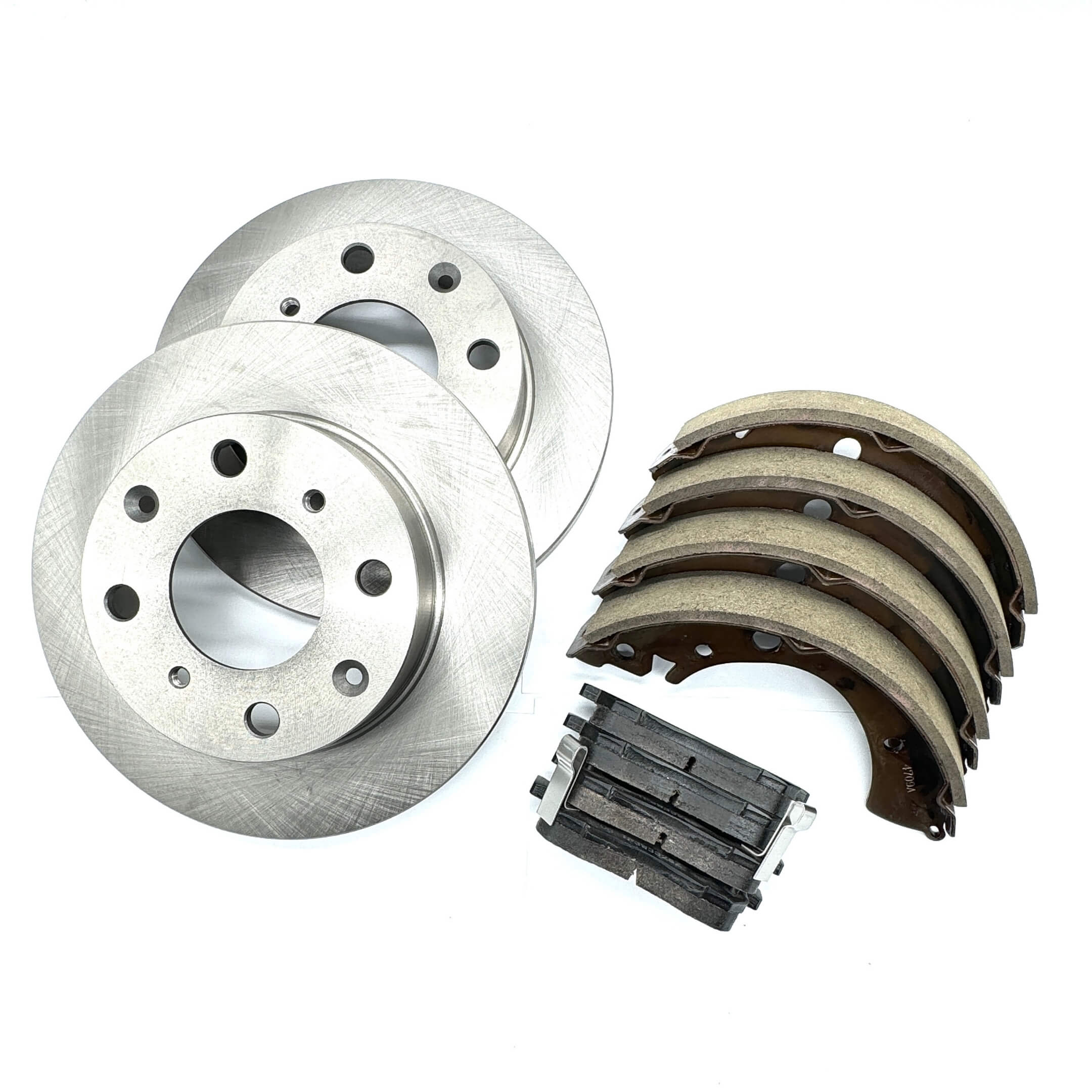 Brake Package - 3 Piece set featuring silver front brake rotors, black front brake pads, and rear brake shoe set for Honda Vamos Van HM1, HM2 models (1999-2018).