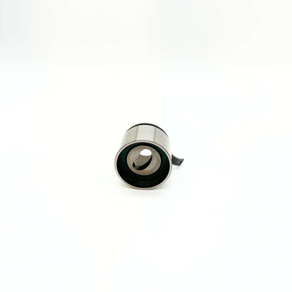 Top view of a tensioner pulley for Suzuki Carry Truck DC51T, DD51T models, 1991-1998, highlighting the grooved wheel and central bearing