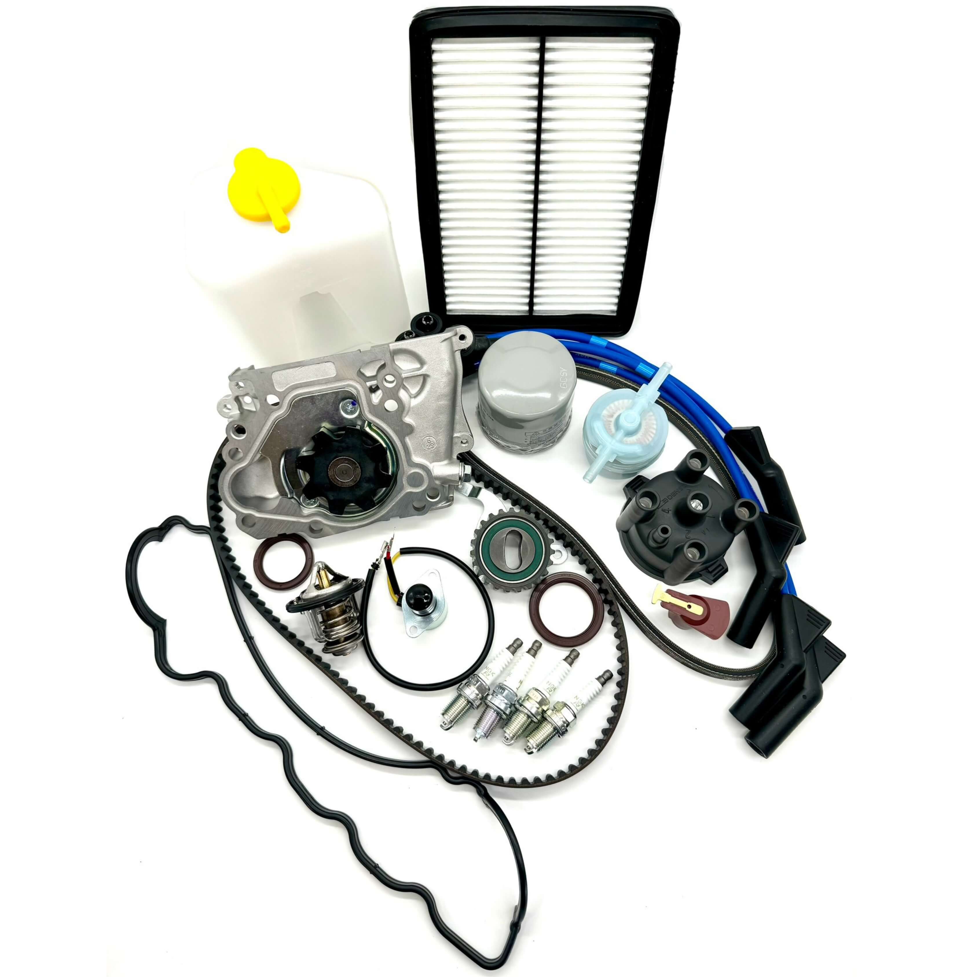 Complete 23-piece timing belt replacement kit for Subaru Sambar KV3 KV4 1990-1998, featuring timing belt, tensioner pulley, cam and crank seals, water pump, alternator belt, thermostat, valve cover gasket, oil, fuel, air filters, spark plugs, distributor cap and rotor, spark plug wires, coolant reserve tank, carburetor solenoid valve assembly for an all-inclusive engine tune-up.