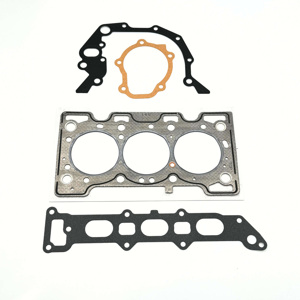 Complete Gasket Kit for Suzuki Carry Truck DC51T, DD51T Models 1991-1998, including a head gasket, valve seals, and various engine block seals, precision-engineered for a perfect fit and optimal sealing performance.