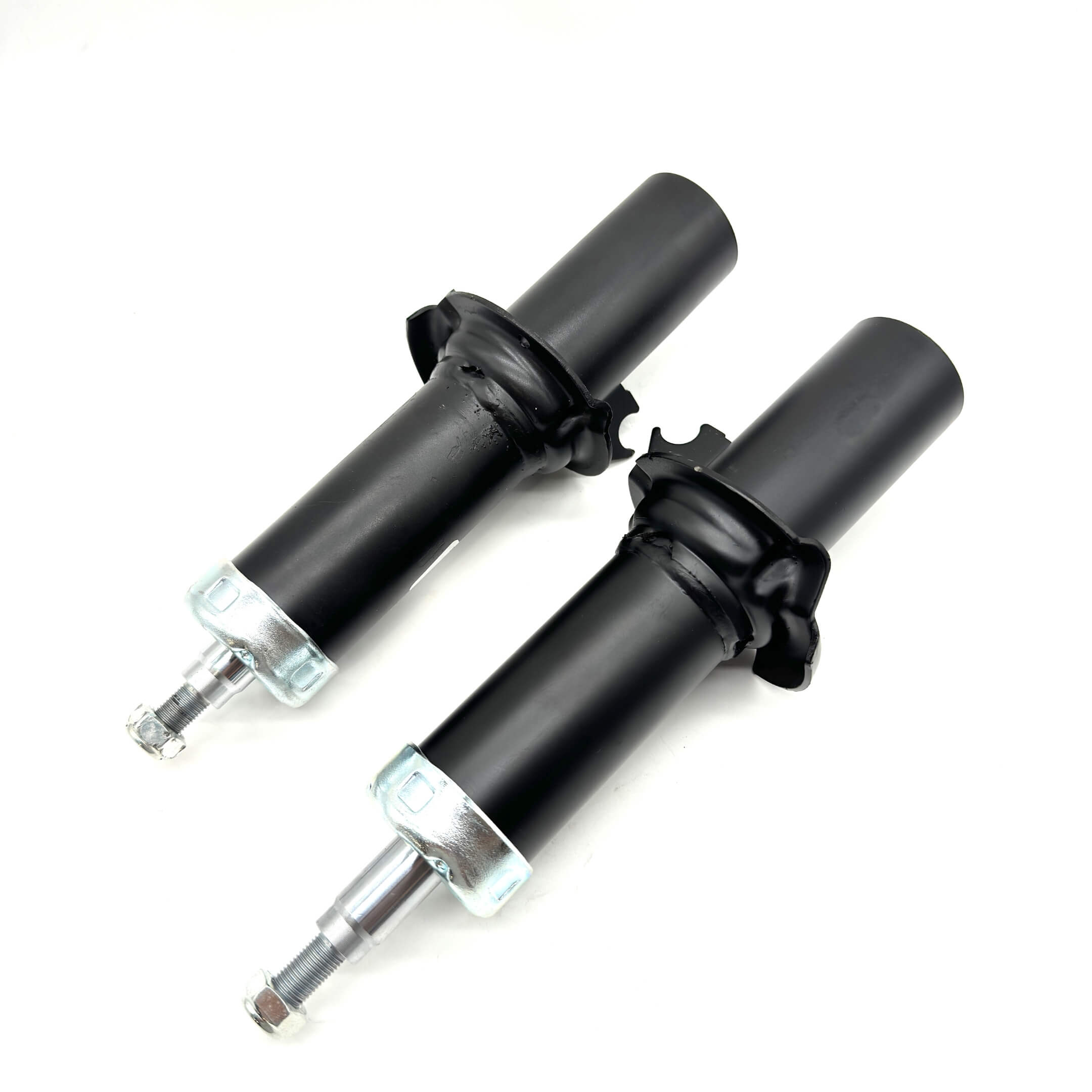 Pair of front struts for Honda Acty, HA3, HA4, 1990-1999, aligned side by side, ready for installation to enhance vehicle stability.