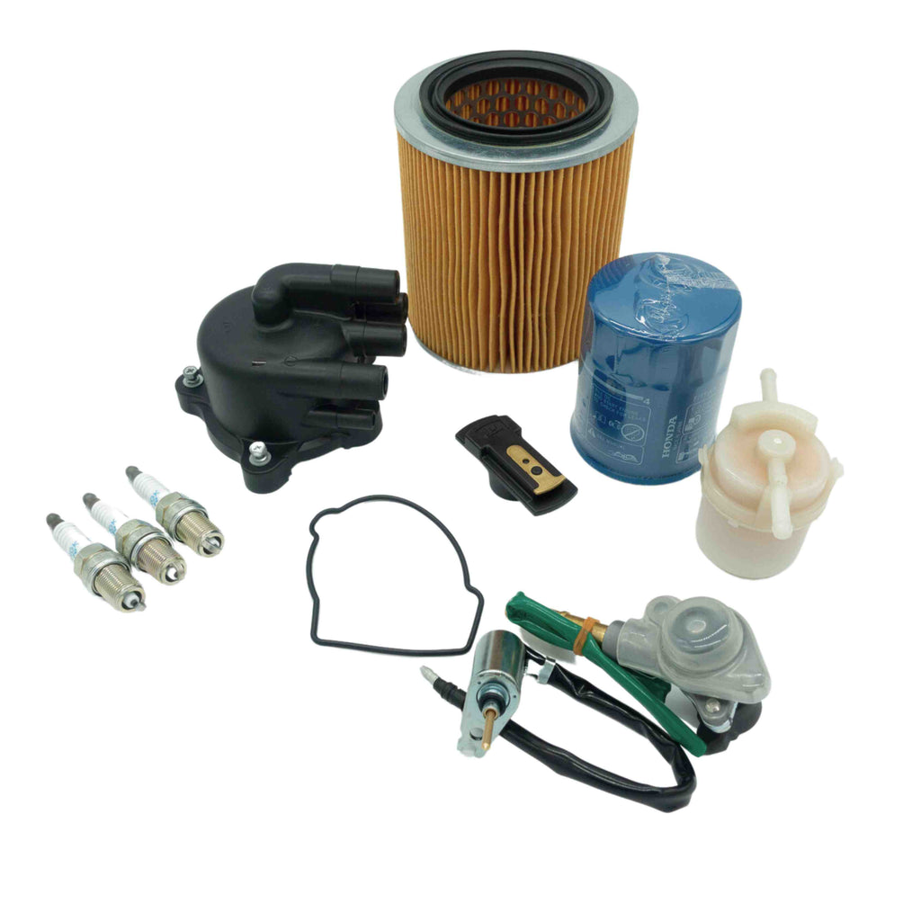 12-piece Honda Acty Truck Tune-Up Kit with air and fuel filters, solenoids, distributor parts, and spark plugs for HA3/HA4 models.