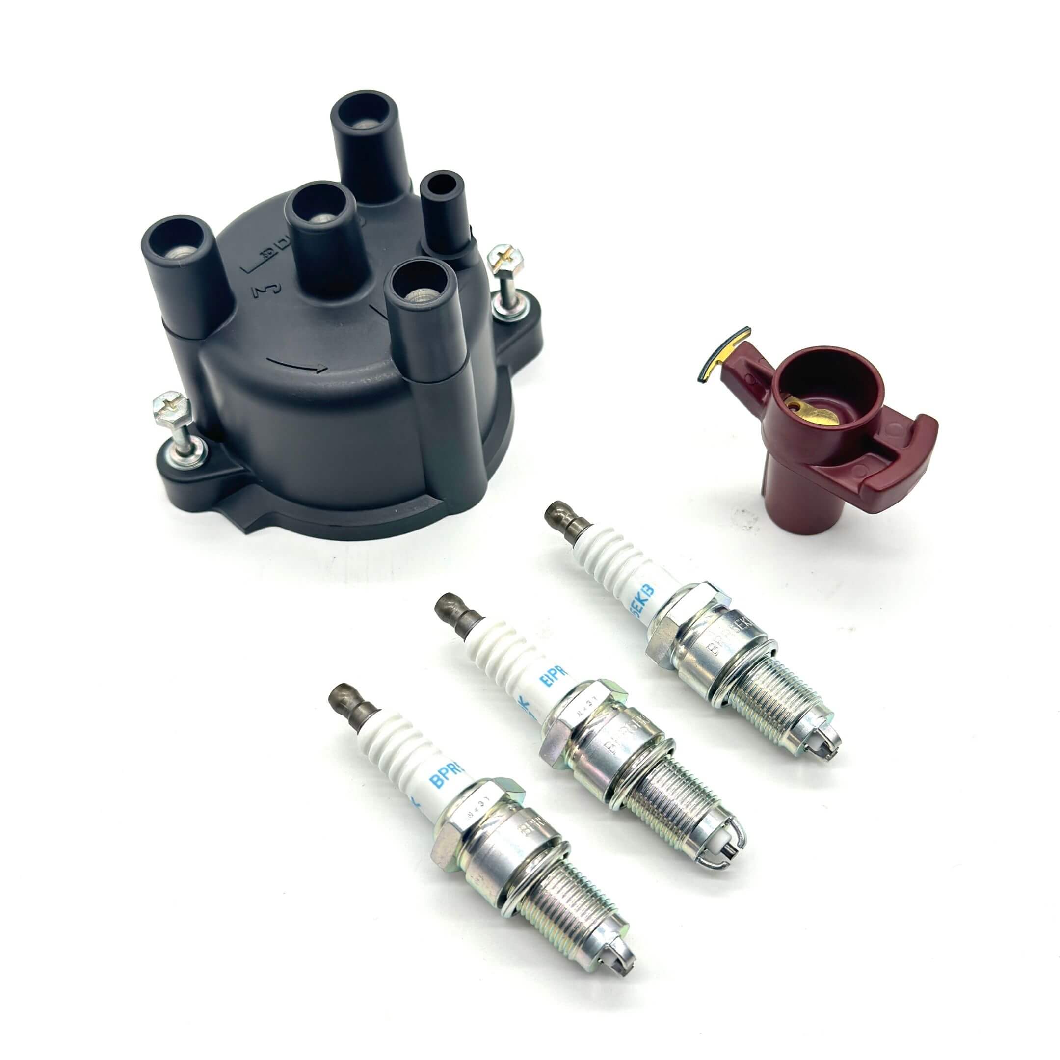 Complete ignition kit with distributor cap, rotor, and spark plugs for Daihatsu Hijet S100P, S110P EFNS engines (1991-1994), ensuring reliable performance.