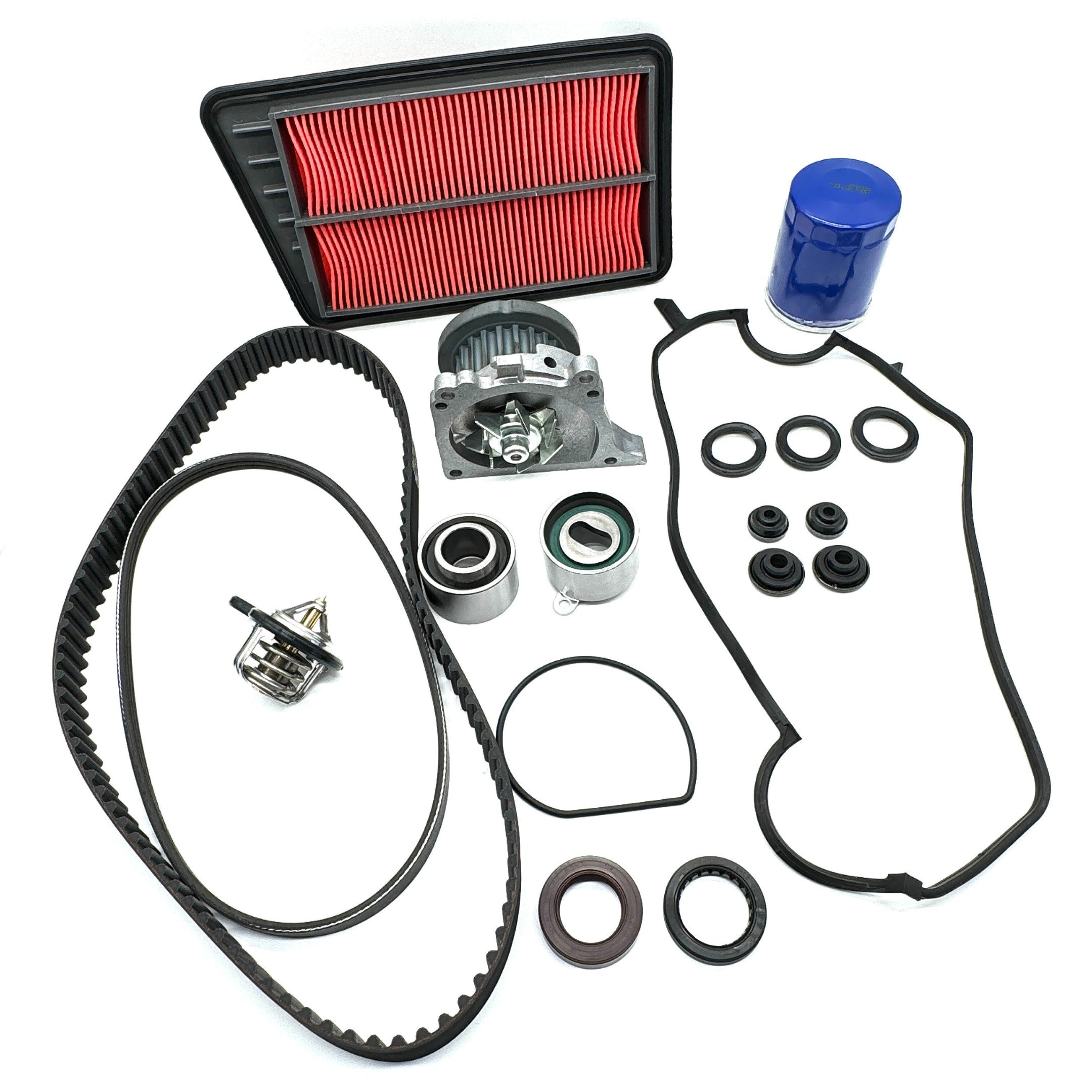 18-Piece Timing Belt Kit for Honda Acty HA6, HA7 (1999-2009), including timing belt, pulleys, water pump, cam and crank seals, thermostat, valve cover gasket kit, alternator belt, oil filter, and air filter.