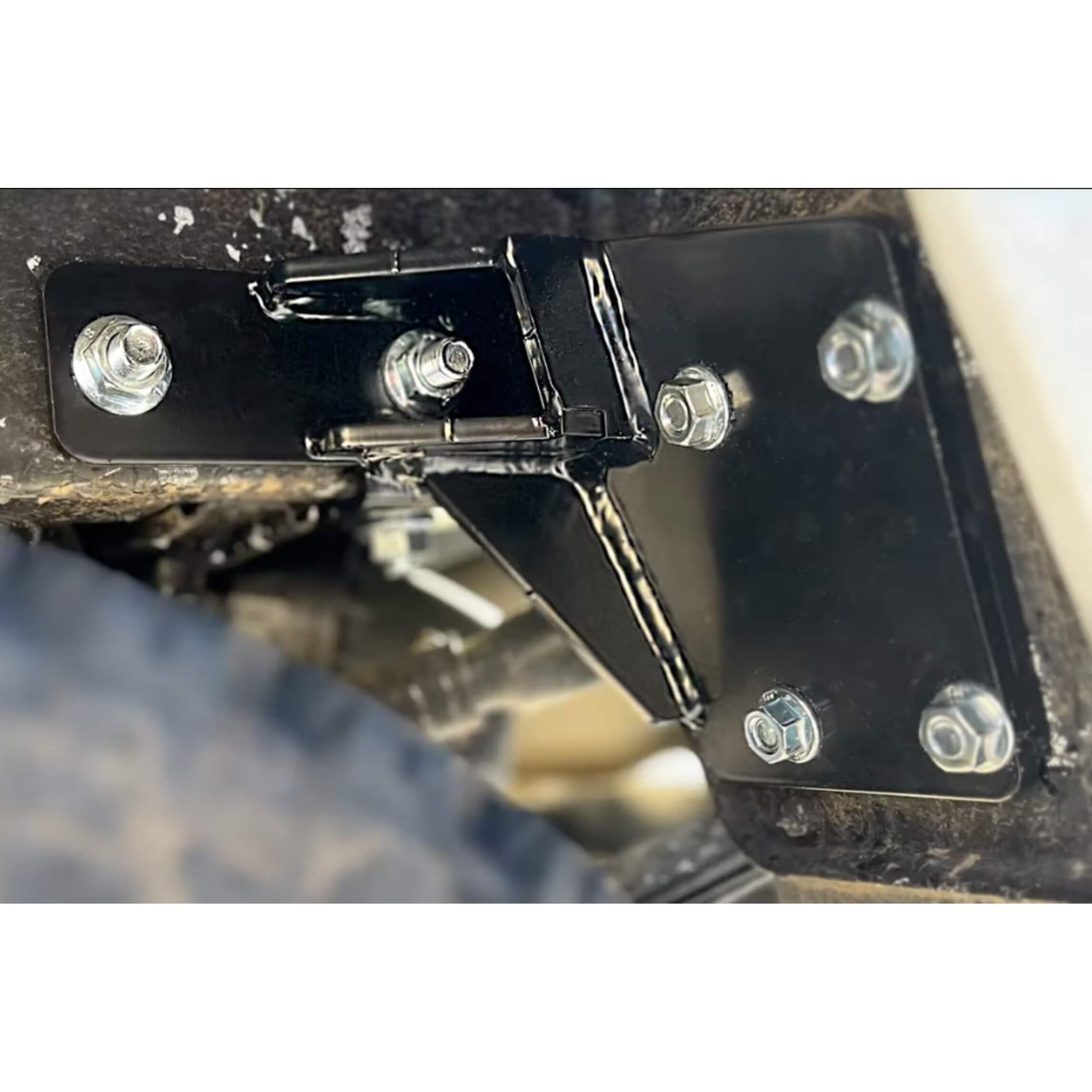 Detailed view of rear tow bumper mount on Honda Acty Truck HA4 model, emphasizing secure installation and durability