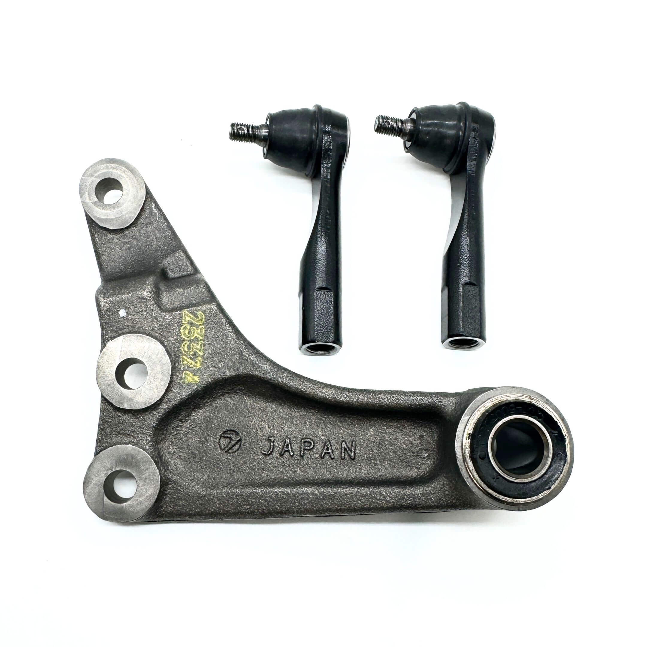 Angled view of the 3-piece steering set for Subaru Sambar Van KV3, KV4 (1990-1998), highlighting the durable construction of outer tie rods and center steering link.