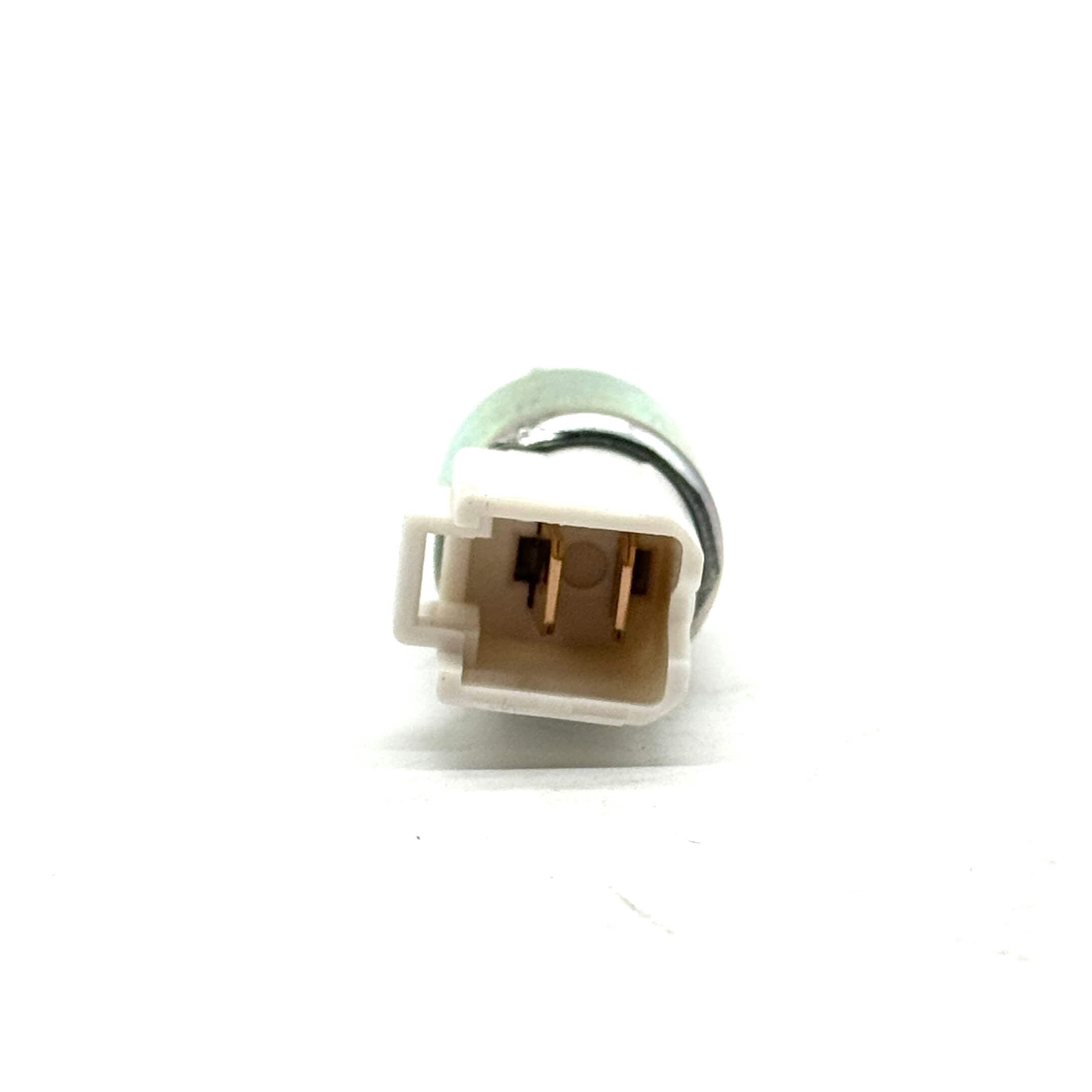 Detailed view of the connector end of a genuine Honda brake pedal light switch for HA3, HA4 models, showcasing the electrical pins for a secure fit.