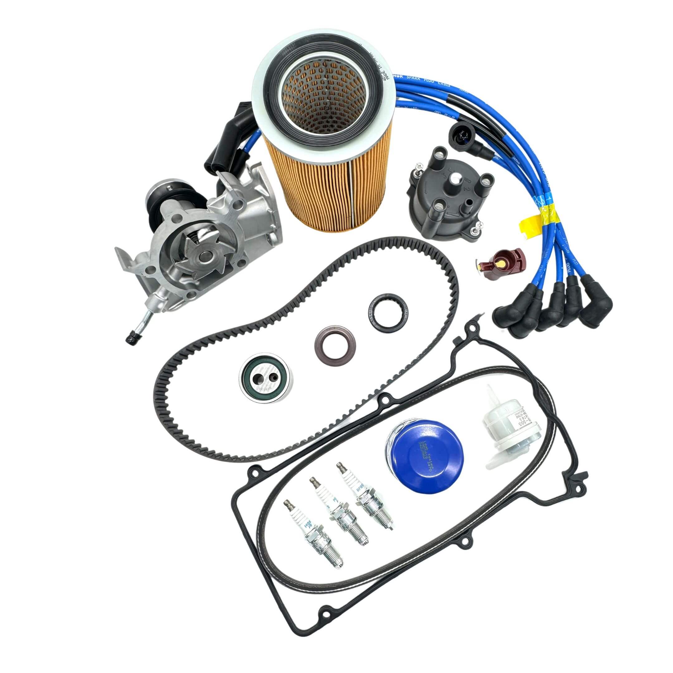 Complete Daihatsu Hijet Timing Belt Kit for EFNS engines with single vent distributor cap, featuring timing belt, filters, NGK spark plugs, and rotor for S100P/S110P models.