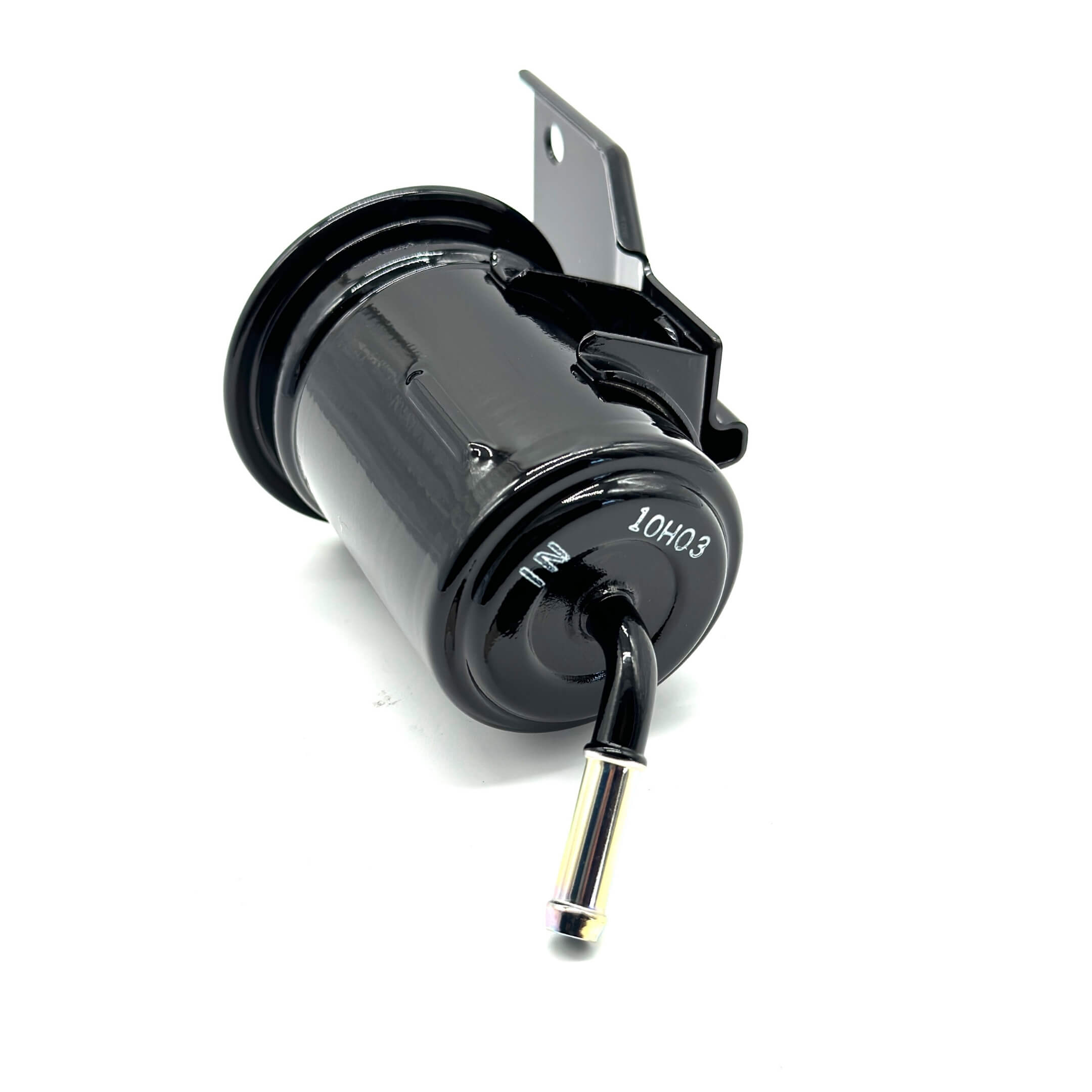 Detailed view of the Subaru fuel filter's inlet and outlet ports for easy and secure connections.