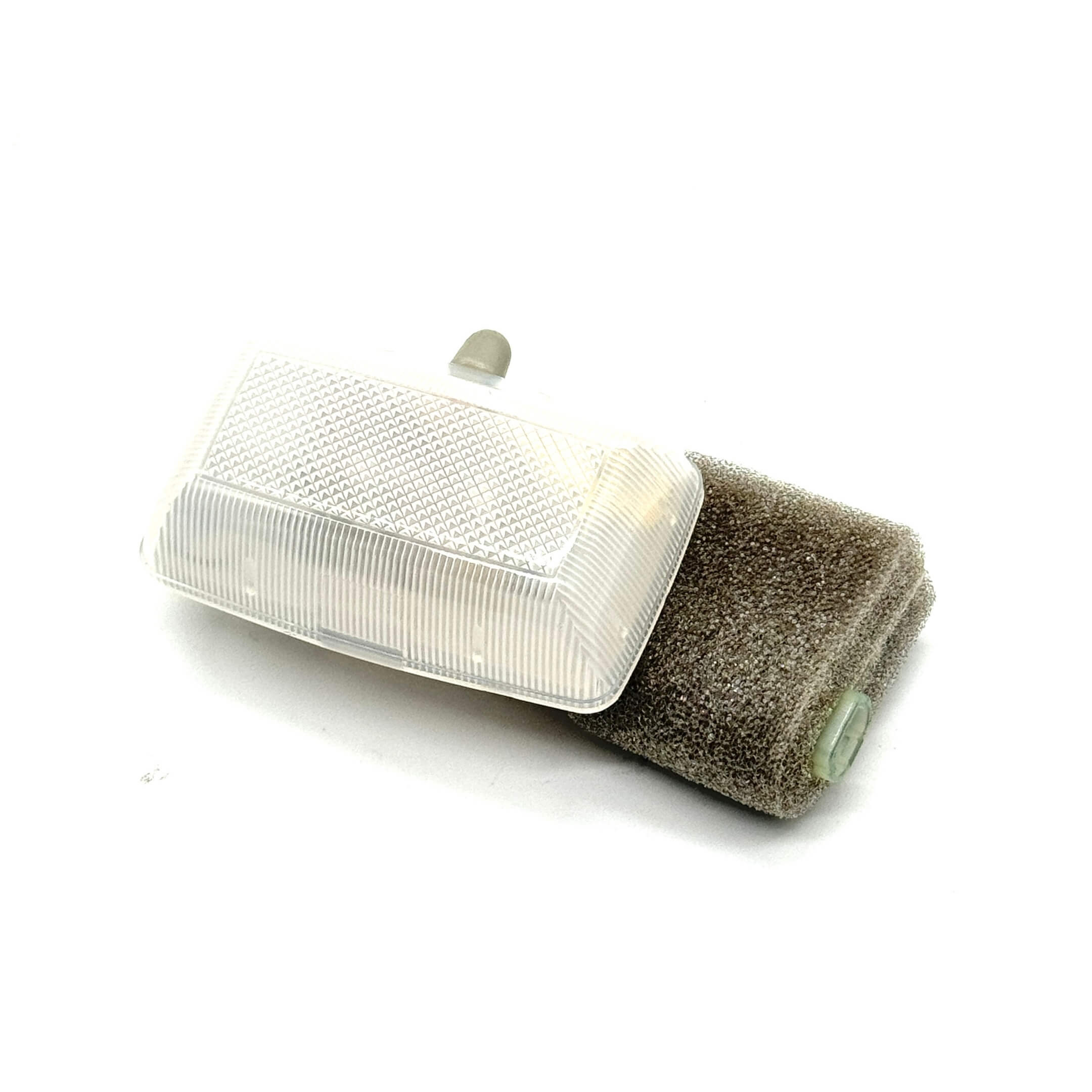 Front view of the Subaru Sambar Dome Light Assembly showing the clear lens and foam backing.