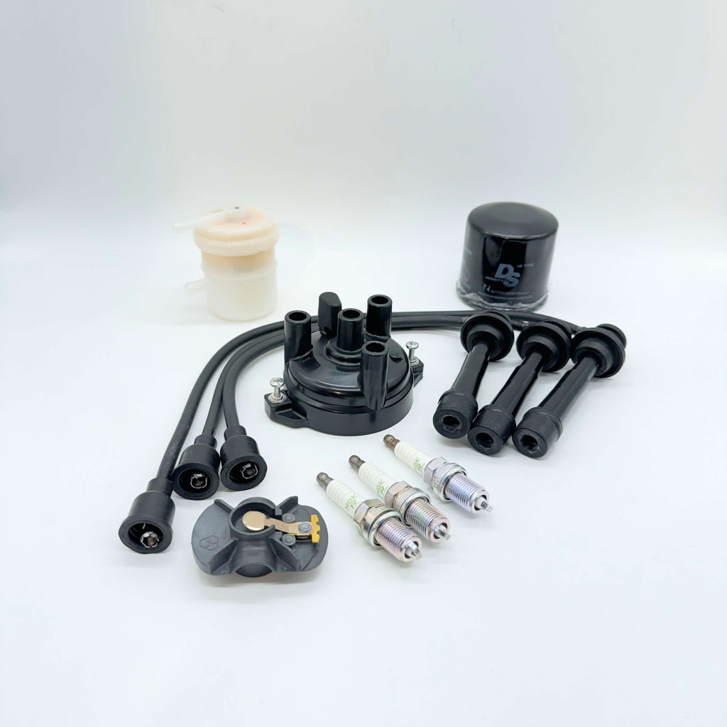 All-inclusive 10-Piece Ignition Kit for 1991-1998 Suzuki Carry Truck DC51T, DD51T models, featuring a durable distributor cap, high-performance spark plugs, spark plug wires, and essential oil and fuel filters for comprehensive maintenance.