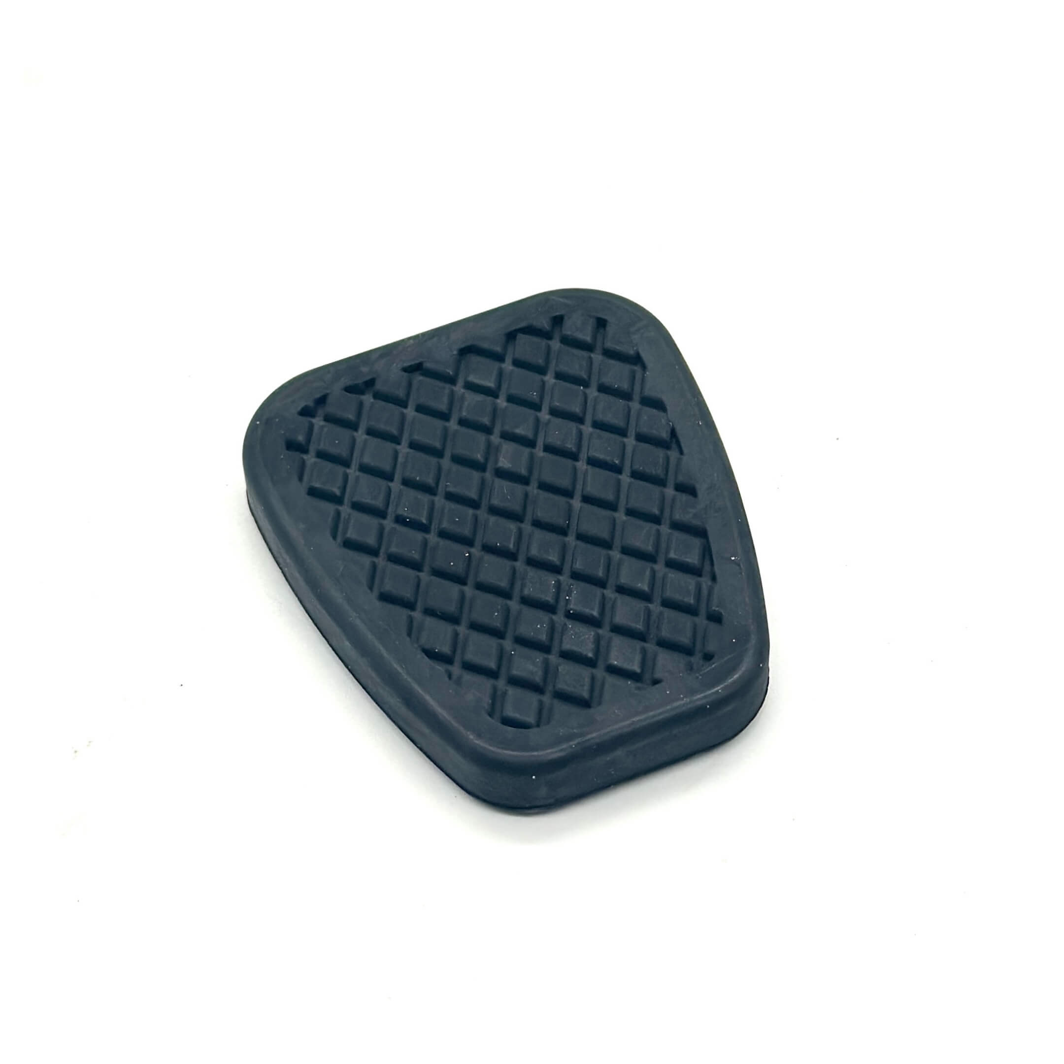 Black rubber clutch pedal pad for Honda Acty Truck HA6, HA7 models, 1999-2009, featuring a textured surface for grip.