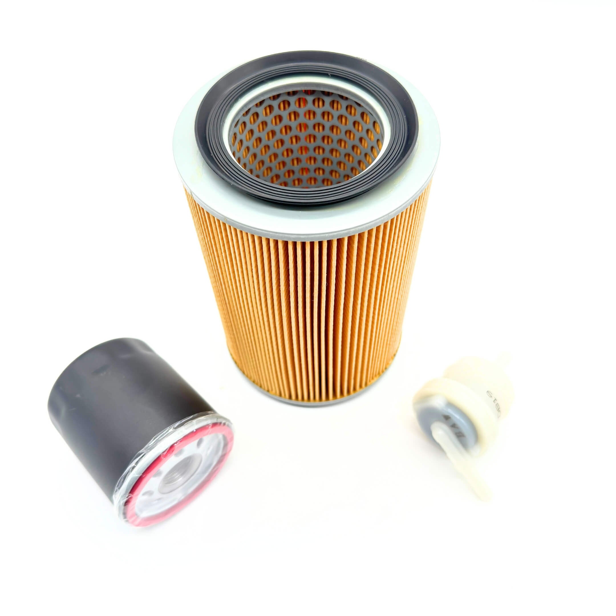 Top view of complete filter kit for Daihatsu Hijet Trucks, including air filter, fuel filter, and oil filter, designed for EF 660cc and EB 550cc carbureted engines.