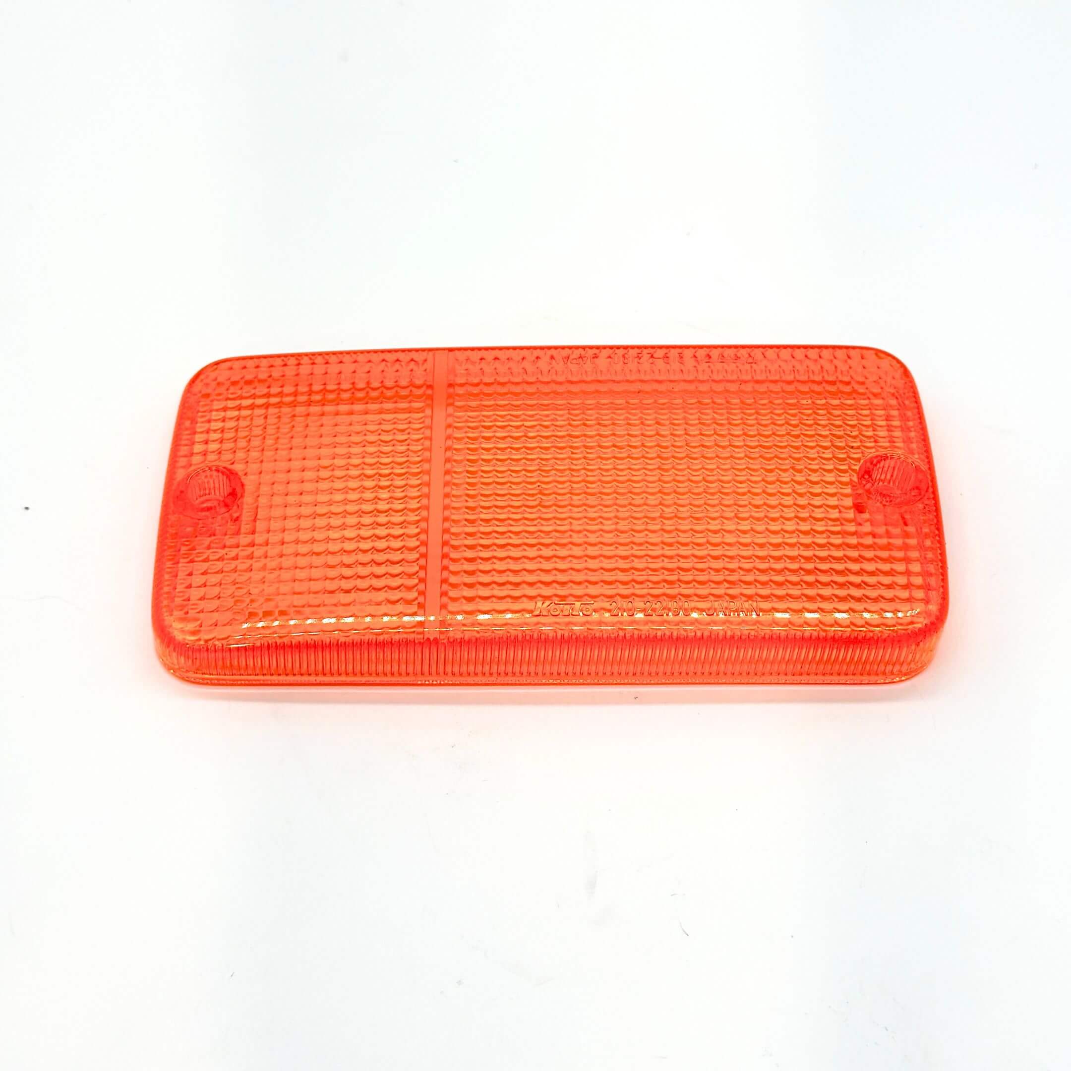 Top-down view of the orange front bumper light lens - left side - designed for Honda Acty Truck HA1, HA2, HA3, HA4 models (1988-1999), showcasing the lens's precision fit and durable construction.