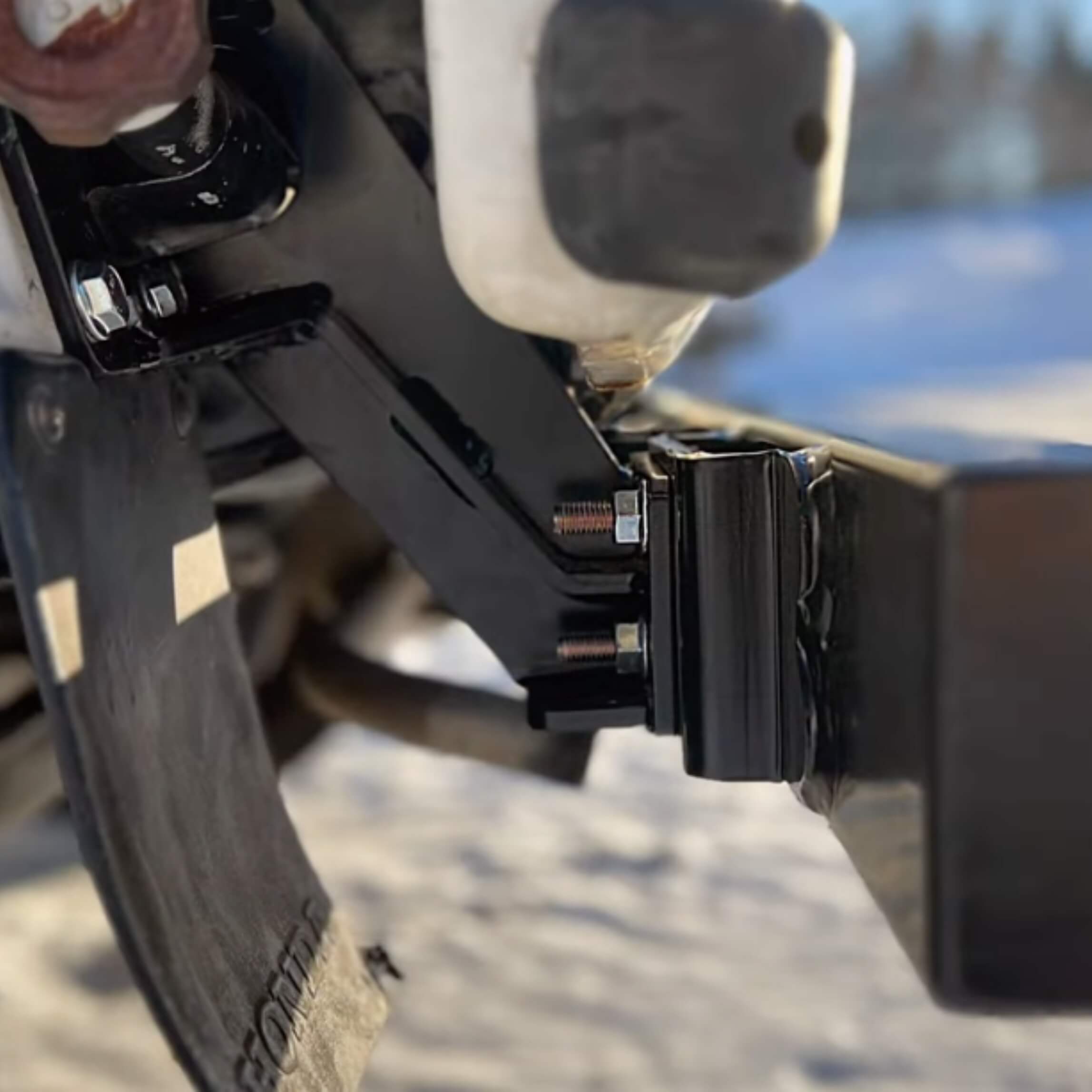 Close-up of rear tow bumper attachment on Honda Acty Truck HA4 model, displaying strong mounting hardware