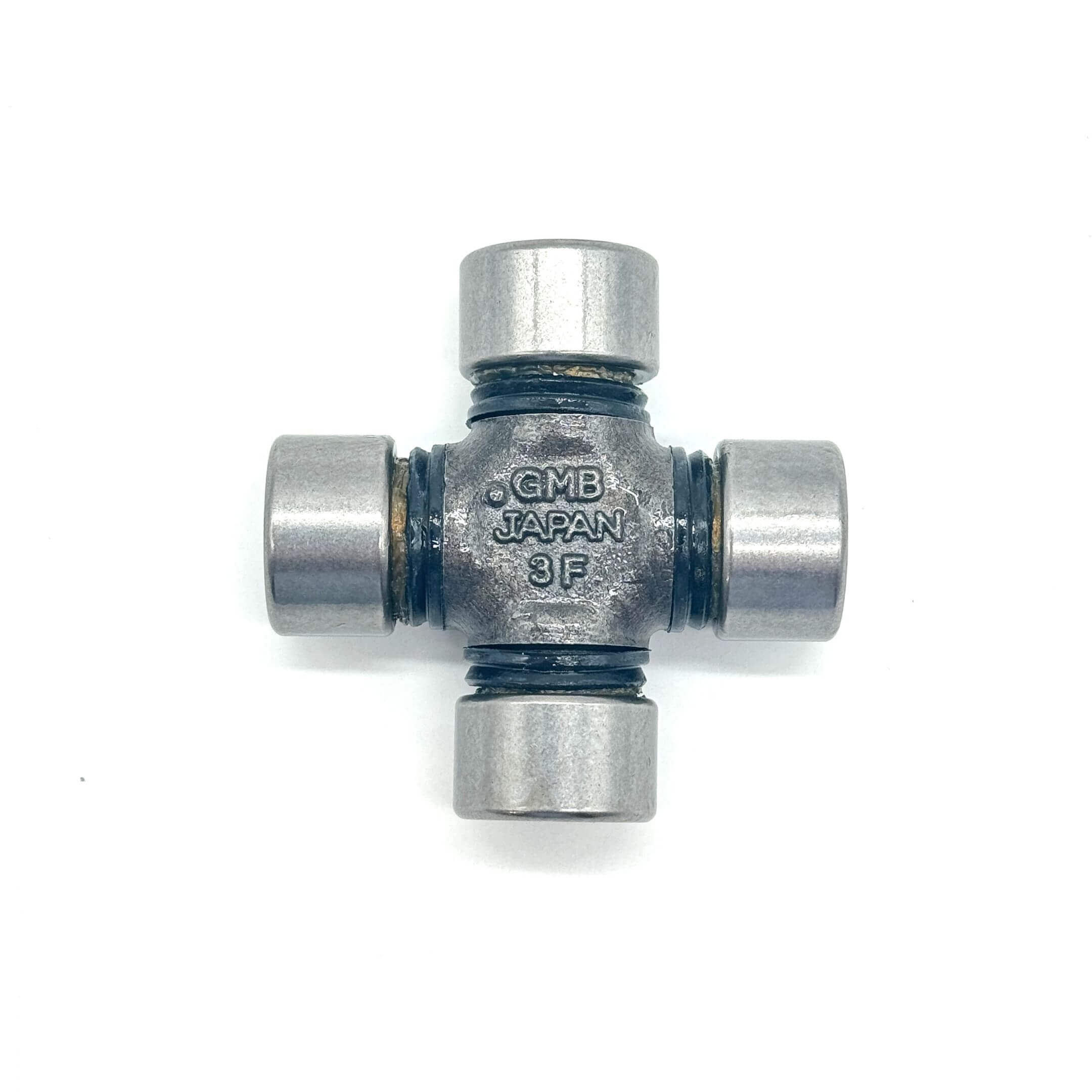 Detailed side view of the U Joint for Honda Acty Truck HA4 (1990-1999), showcasing the robust build and exact fit for drive shaft and propeller shaft connections.