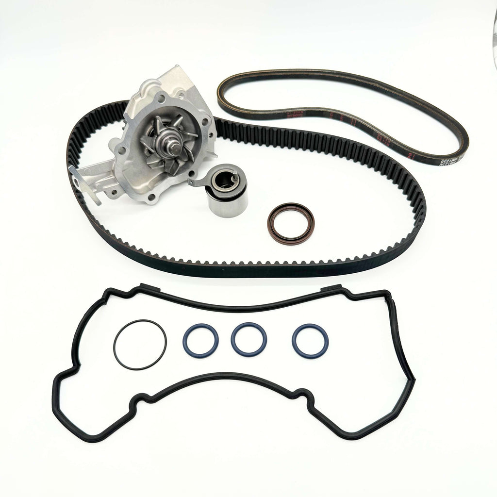 Suzuki Carry timing belt kit for 1991-1998 DC51T/DD51T trucks, featuring a water pump, tensioner bearing, idler pulley, timing belt, cam and crank seals, and valve cover gasket set on a white background