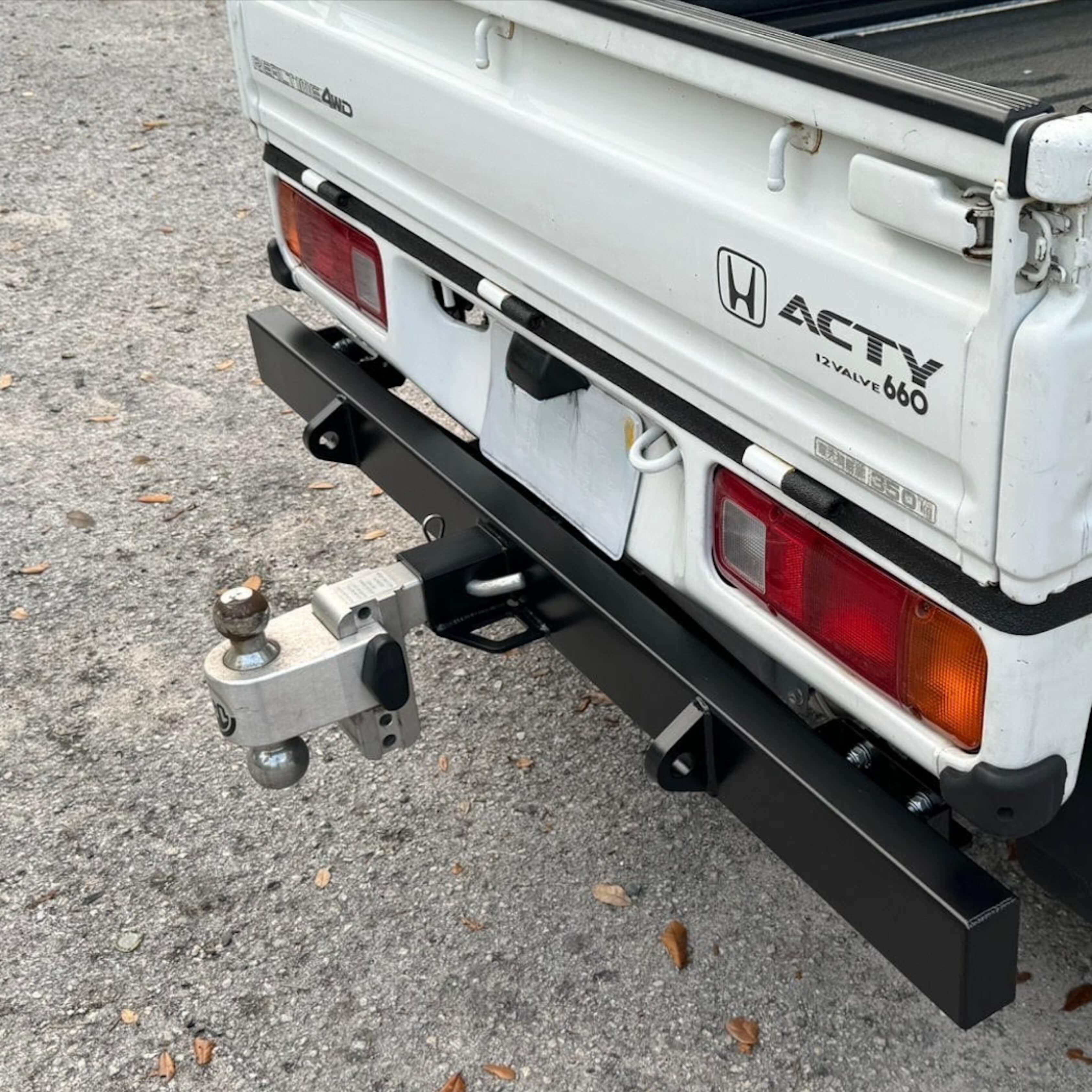 Rear tow bumper installed on Honda Acty Truck HA4 model, showcasing durability and fitment for 1990-1999 models