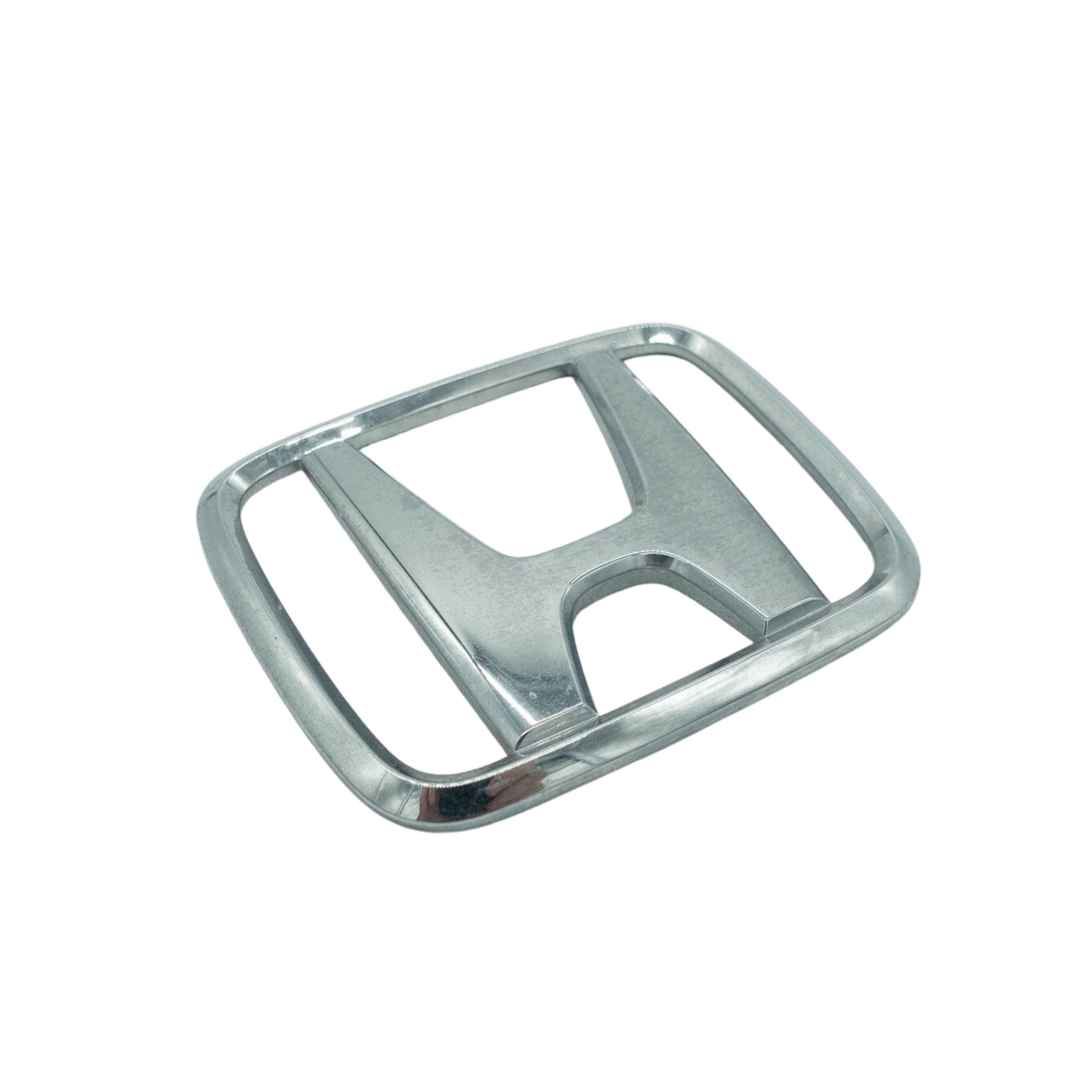 Shiny chrome Honda emblem frame for Acty Van HH1, HH2, HH3, HH4 models from 1990-1999, perfect for restoring the authentic look of your vintage mini Van