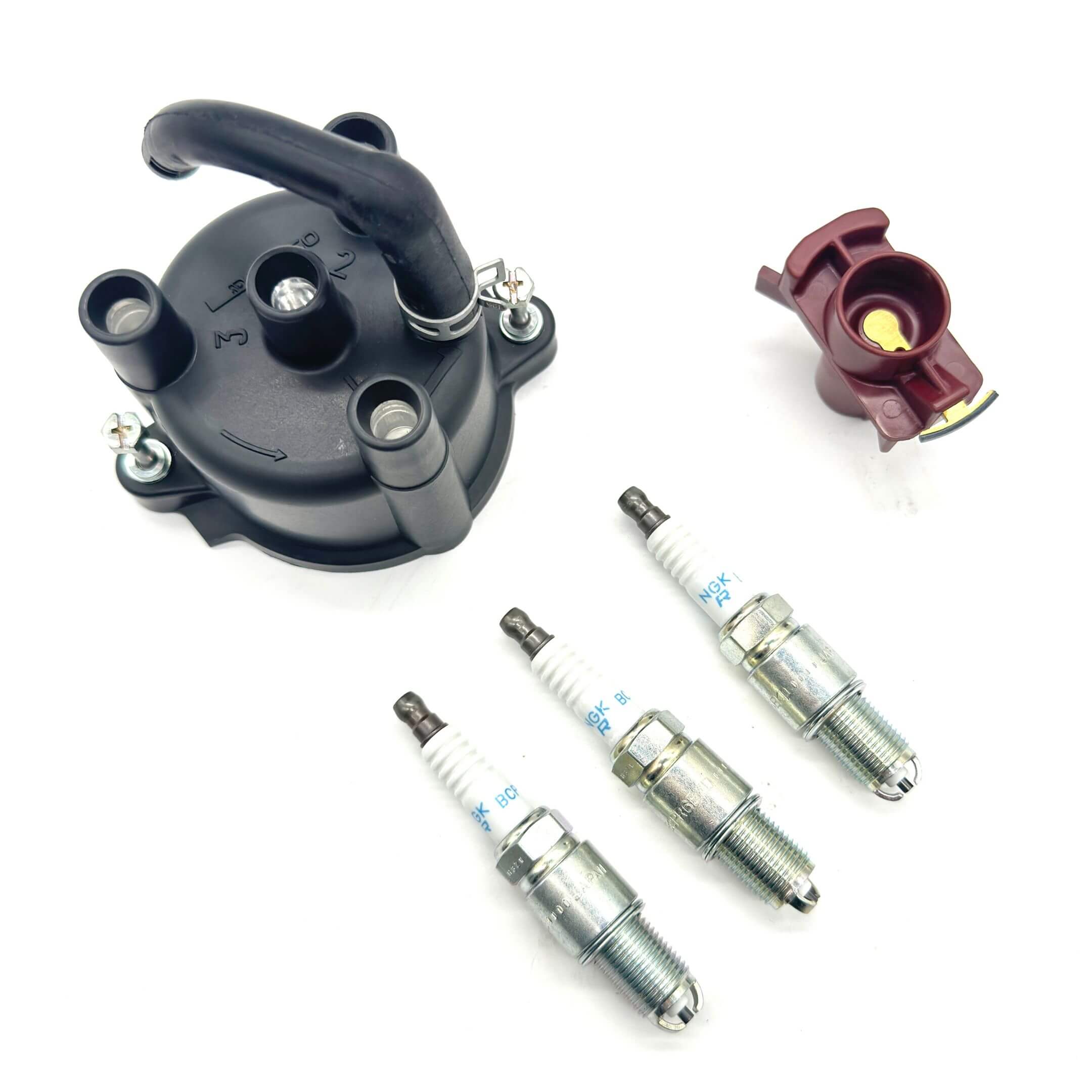 Complete ignition kit with distributor cap, rotor, and spark plugs for Daihatsu Hijet S100P/S110P EFI EFTS, EFES engines, ensuring reliable performance (1994-1998).