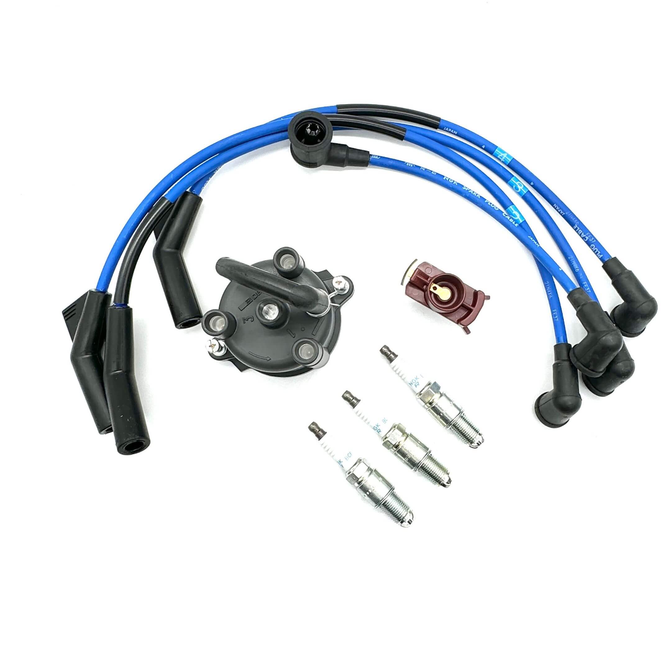 Complete ignition kit for Daihatsu Hijet S100P and S110P (1994-1998), featuring distributor cap, rotor, NGK spark plug wires, and spark plugs.