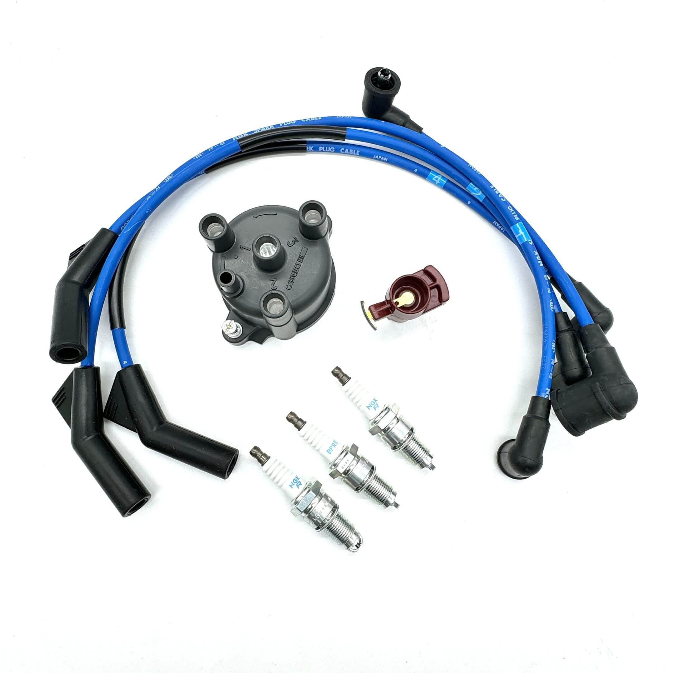 Detailed ignition kit components, including NGK spark plug wires, distributor cap, rotor, and spark plugs for Daihatsu Hijet EFNS engines.