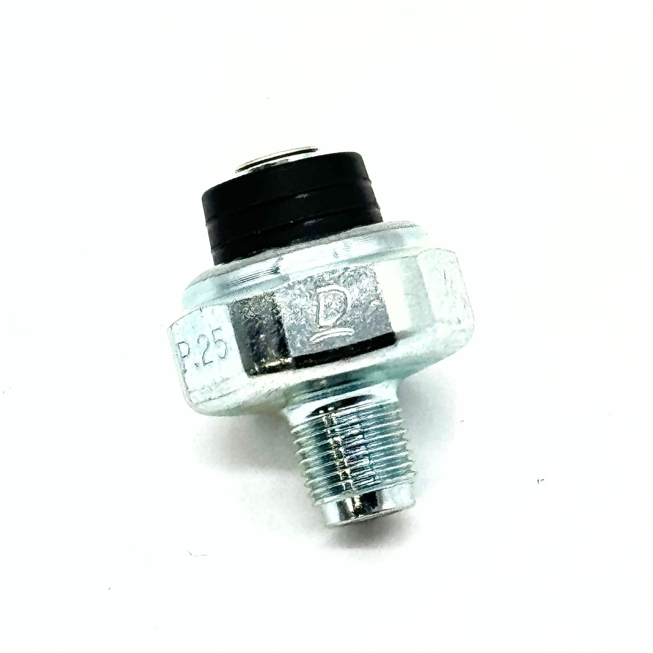 Close-up of the Oil Pressure Switch for Honda Acty Truck HA3, HA4 (1990-1999) with engraved markings.