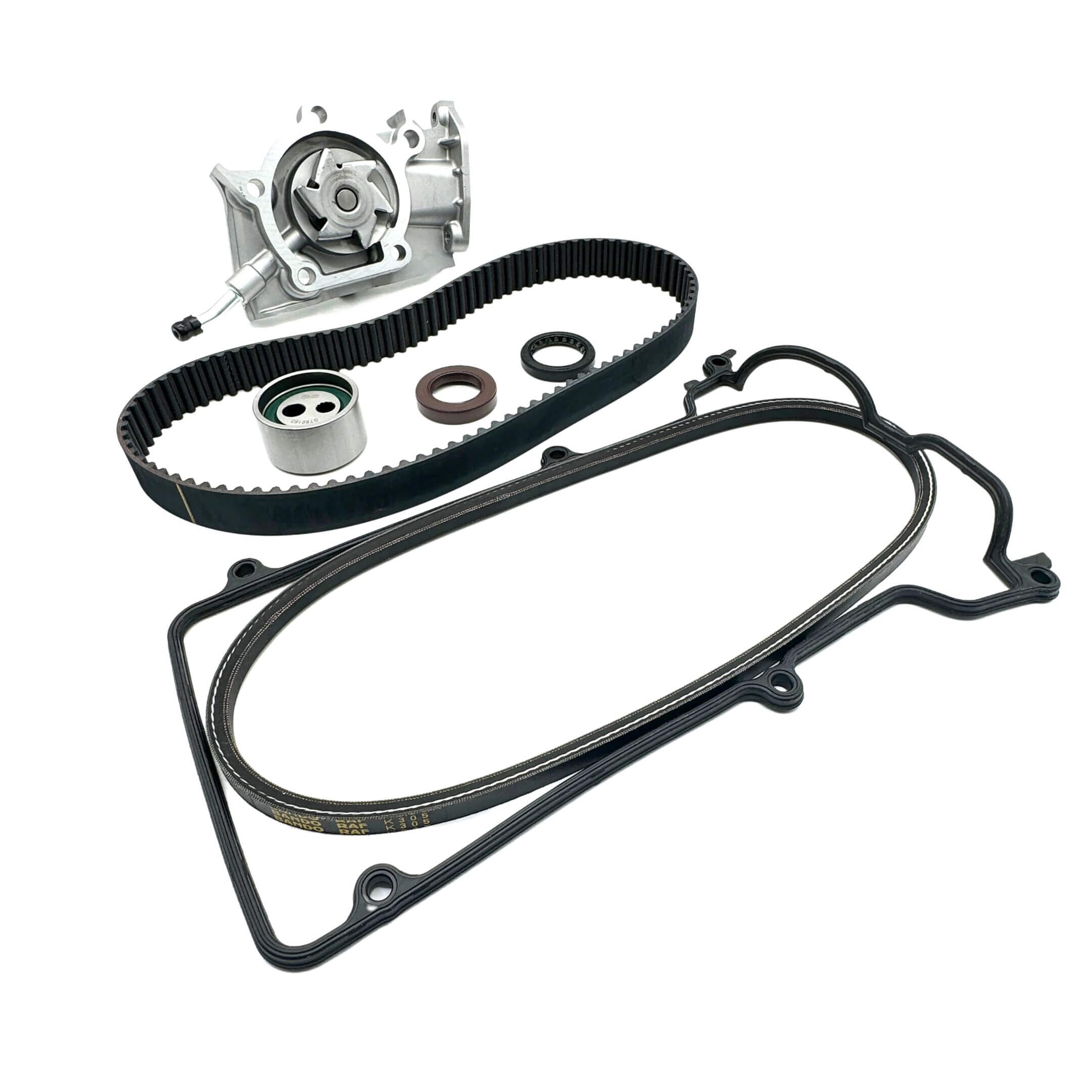 Detailed view of Daihatsu Hijet S100P/S110P Timing Belt Kit components, including gaskets, seals, belts, and water pump for reliable engine performance.