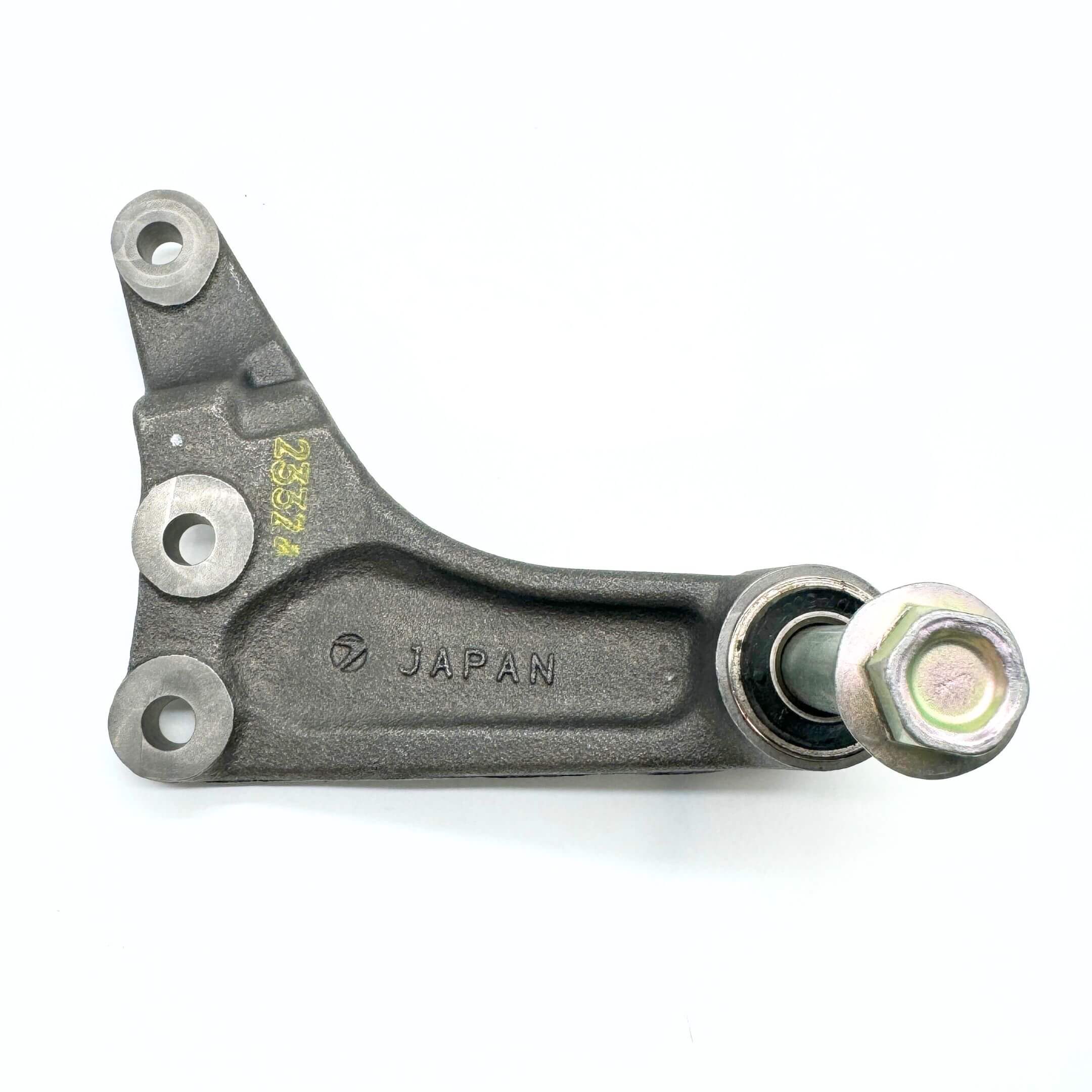 Close-up of the center steering link pin and its mounting bracket, designed for Subaru Sambar Truck KS3, KS4 (1990-1999), showcasing precision engineering.