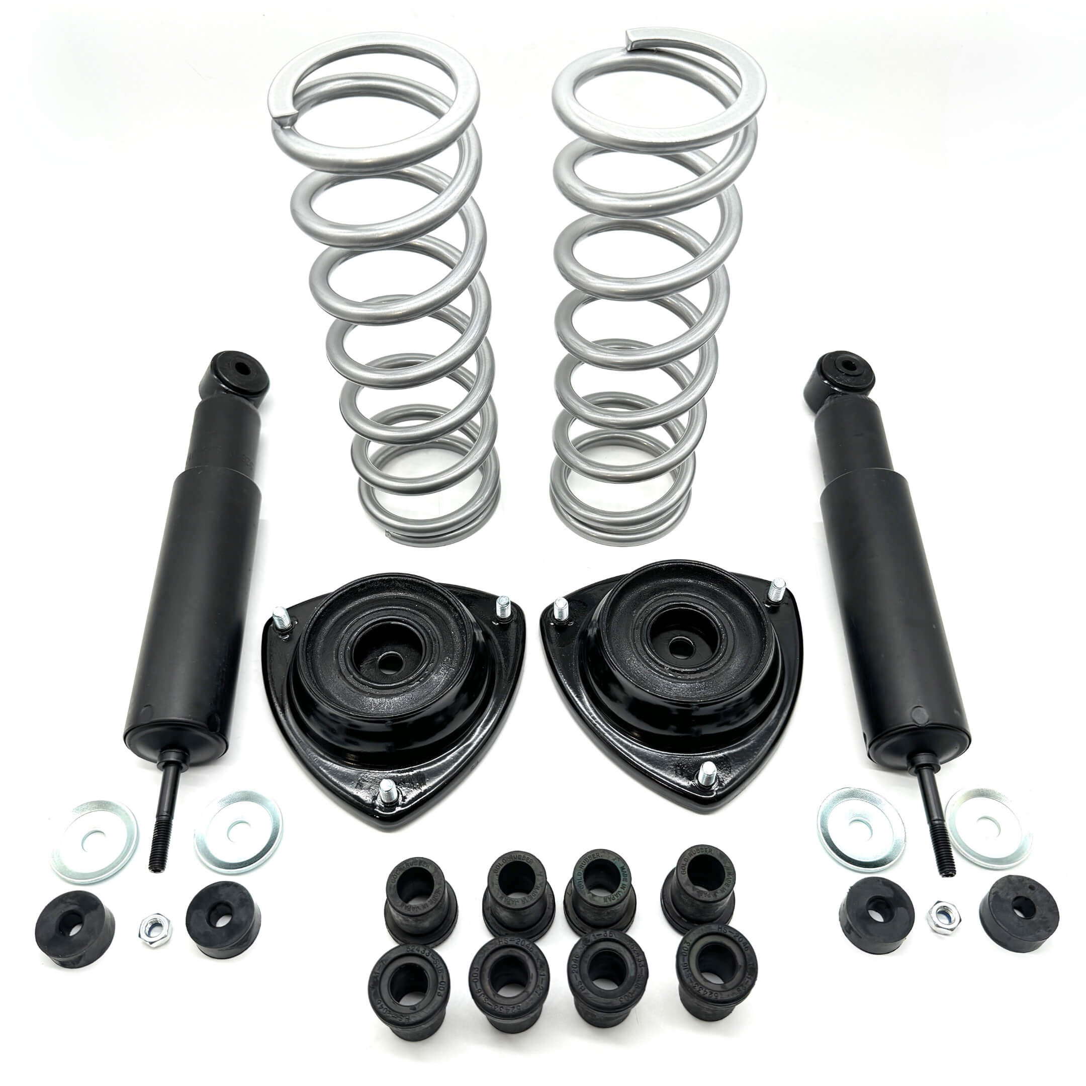 Comprehensive front and rear suspension upgrade kit for Honda Acty Truck HA3, HA4 1990-1999 featuring shock absorbers, springs, top mounts, and bushings.