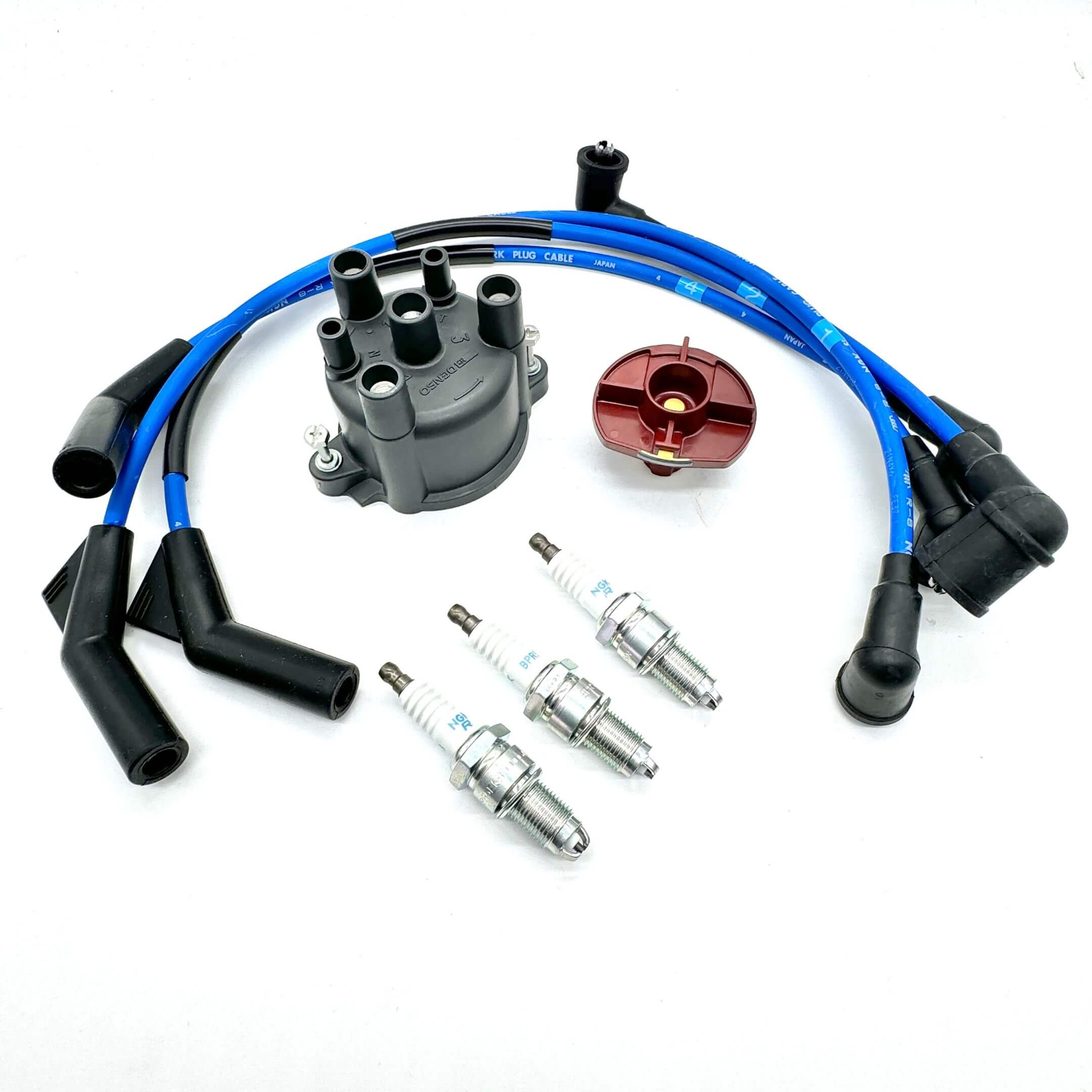 Ignition kit with distributor cap, rotor, NGK spark plugs, and spark plug wire set for Daihatsu Hijet S100V, S110V EFNS engines, ensuring reliable ignition performance.