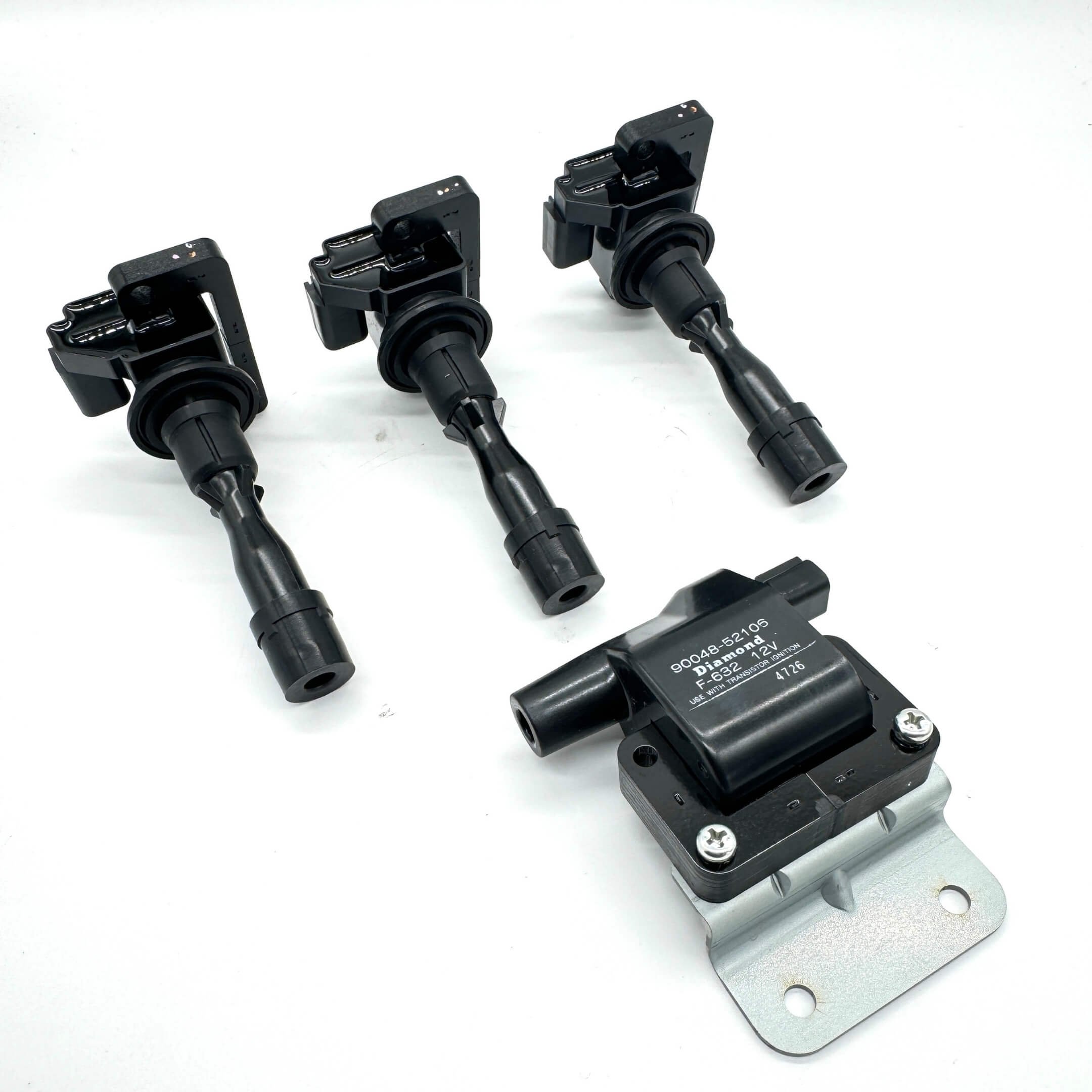 4-Piece Genuine Daihatsu Ignition Kit for EFGS Engines in Daihatsu Hijet S100P and S110P (1994-1998), featuring three ignition coils and one ignition coil assembly with bracket for optimal performance.