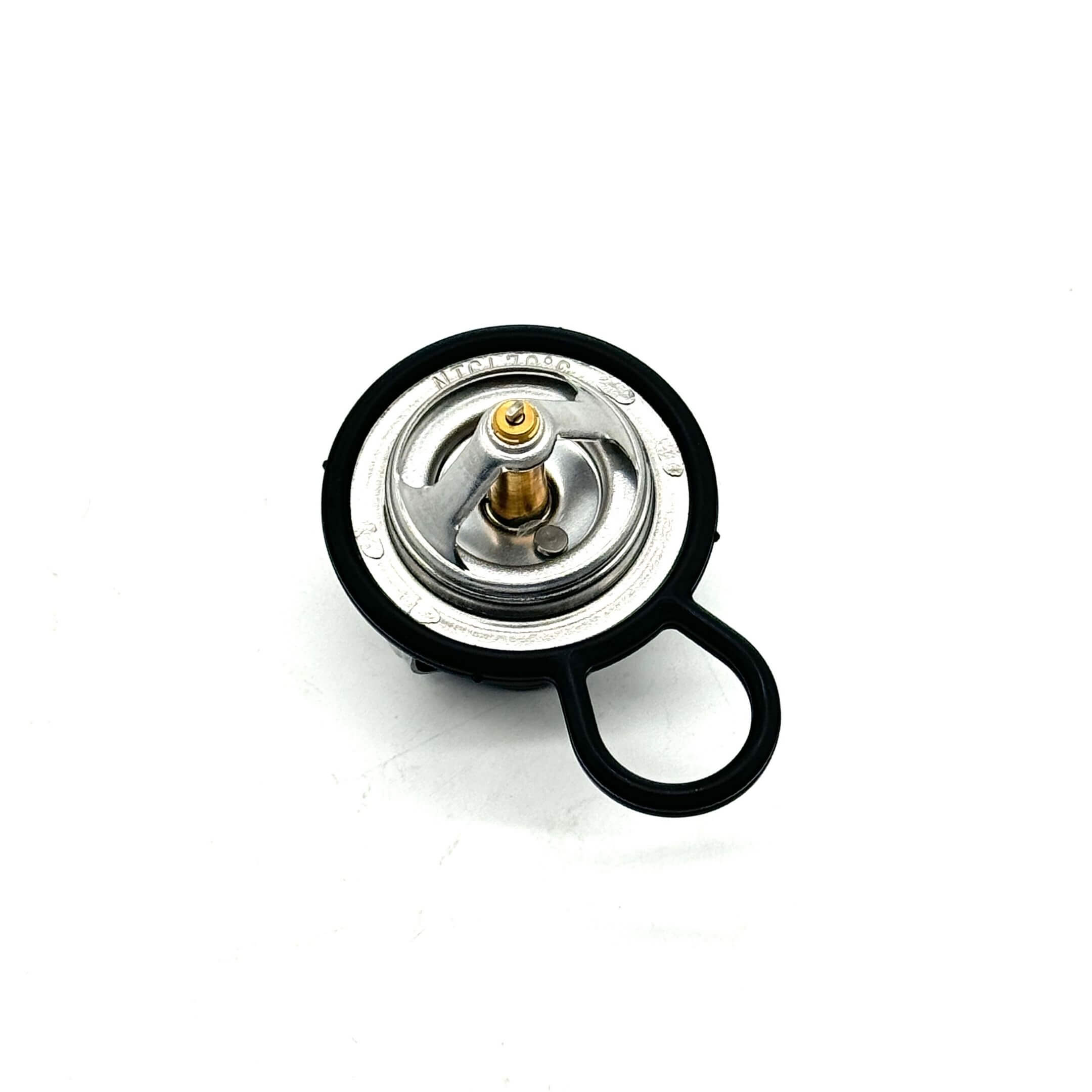 Thermostat top view for Honda Acty Truck HA6, HA7 models, featuring metal construction and coolant regulation mechanism.