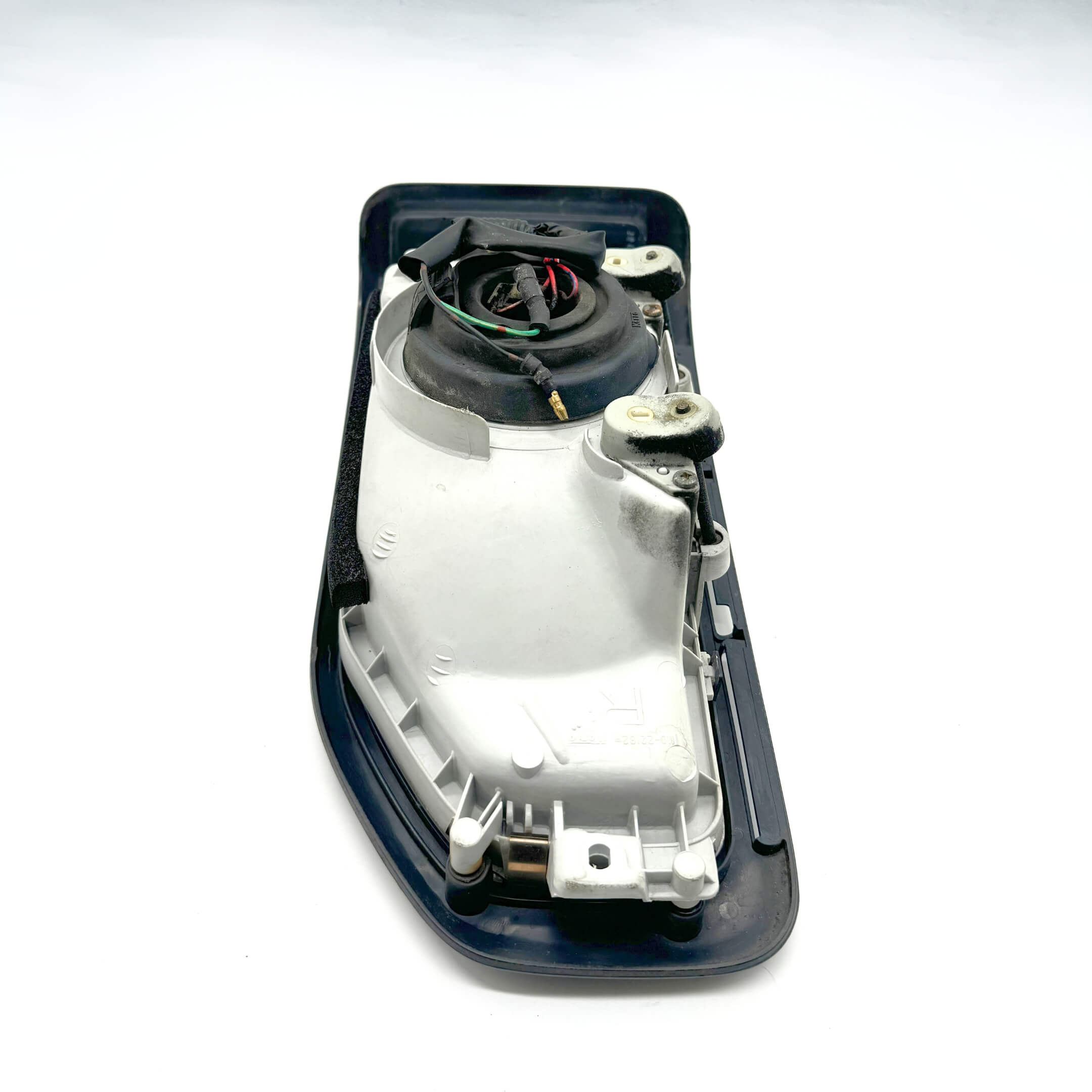 Top view of right headlight assembly for Honda Acty Truck HA3, HA4 models 1990-1993 showing mounting points.