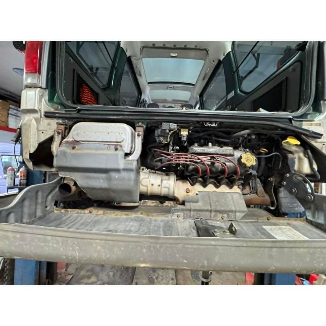 Oiwa Growler Exhaust for Subaru Sambar Truck TT1, TT2 Models (1999-2012) showcasing its behind-the-bumper installation.
