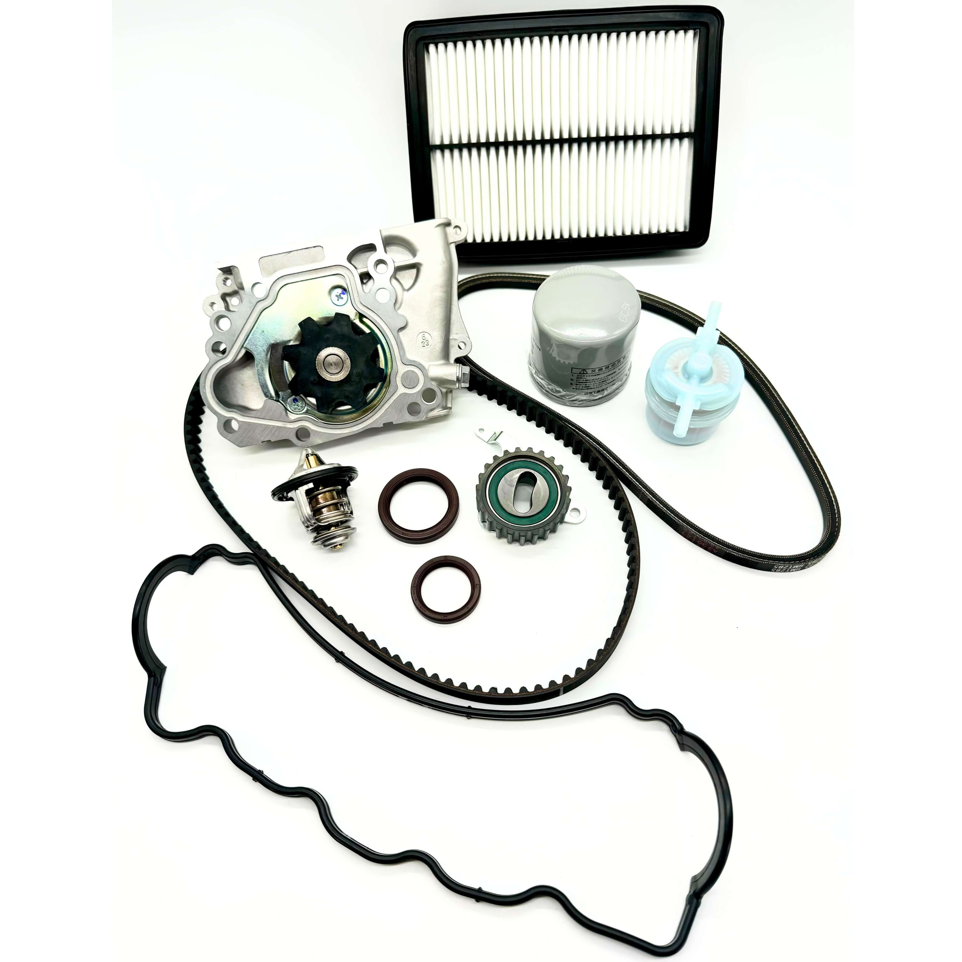 Subaru Sambar KS3 KS4 1990-1998 timing belt kit including timing belt, tensioner pulley, cam and crank seals, water pump, alternator belt, thermostat, valve cover gasket, oil filter, fuel filter, and air filter for complete engine tune-up.