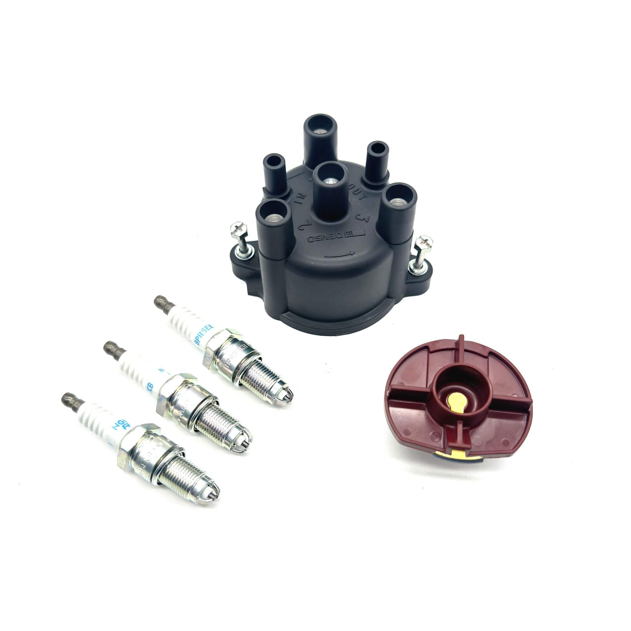 OEM ignition kit for Daihatsu Hijet S100P/S110P EFNS engines, featuring distributor cap, rotor, and spark plugs for improved engine performance.