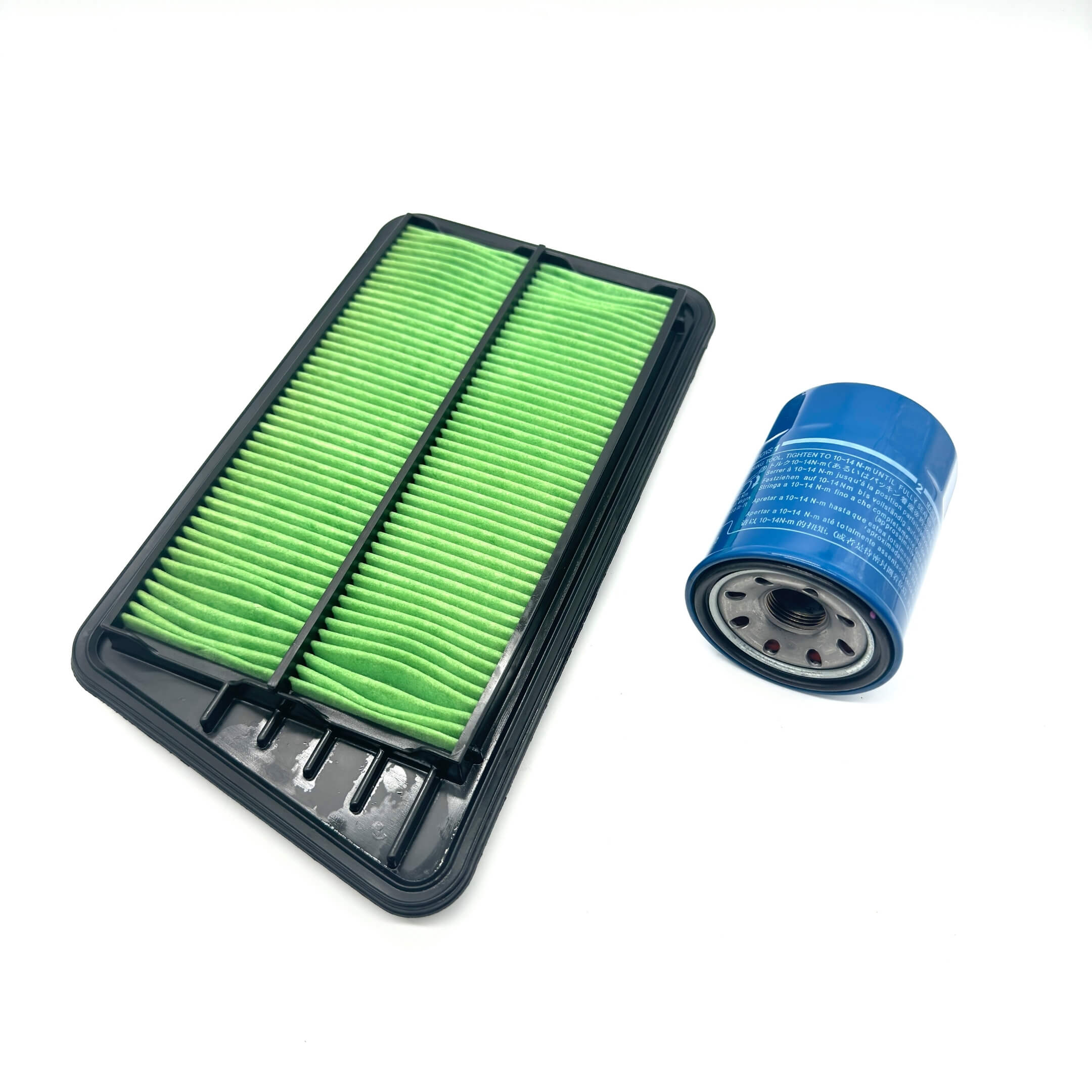 2 Piece Filter Package for Honda Acty Truck HA6, HA7 Models (1999-2009), featuring a green rectangular air filter and a blue cylindrical oil filter.