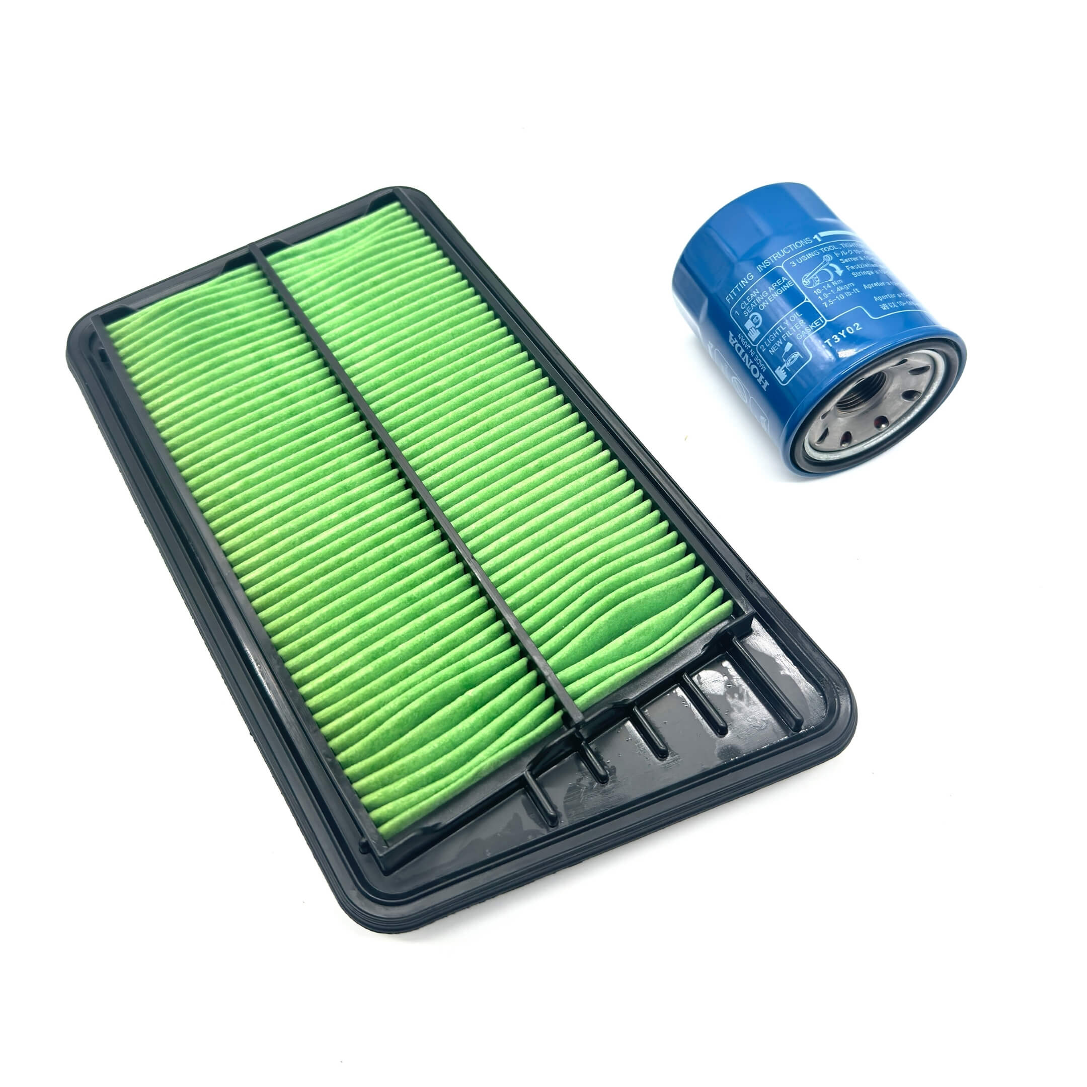 Genuine Honda 2 Piece Filter Package for Honda Vamos Van HM1, HM2 Models (1999-2018) featuring a green air filter and blue oil filter.