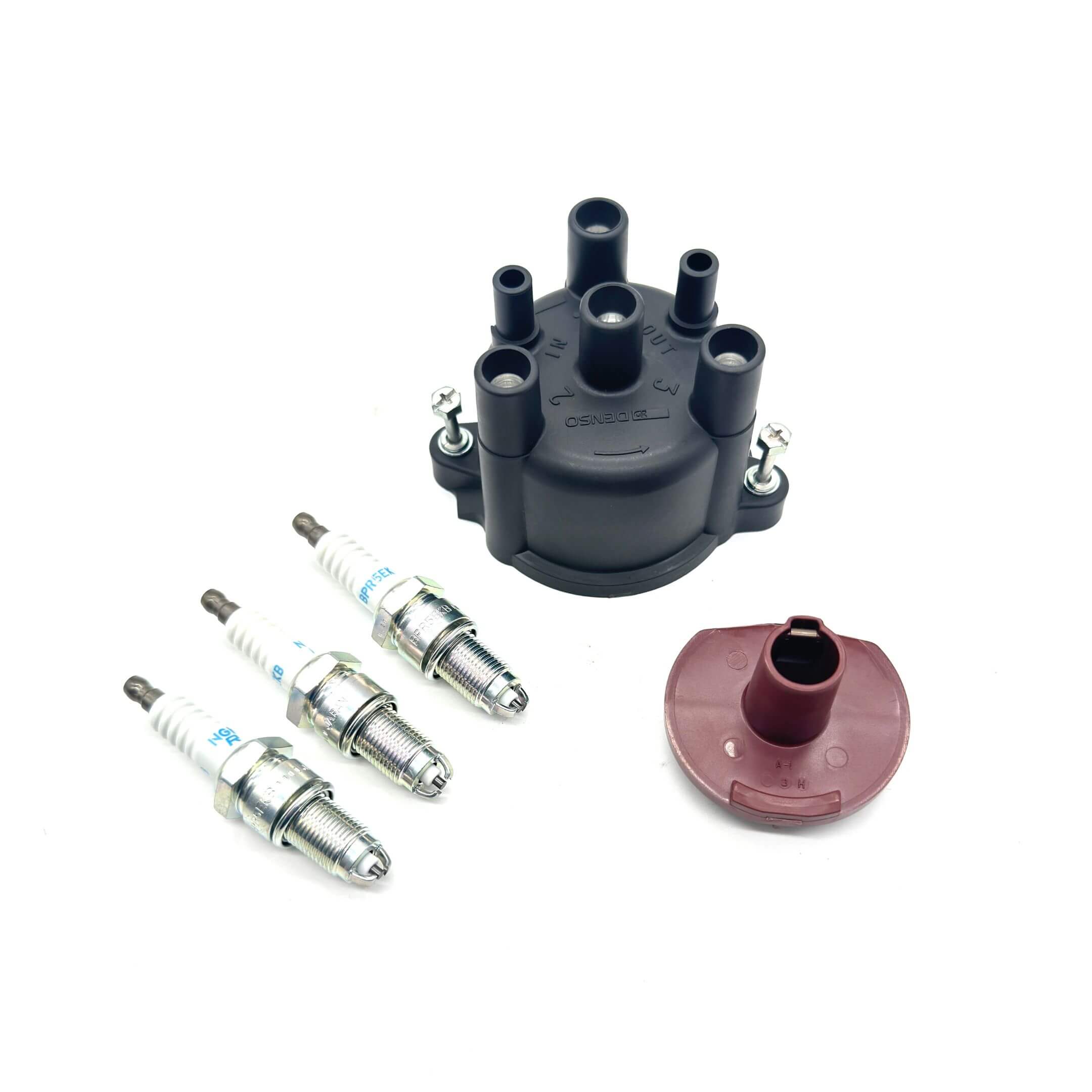 Detailed ignition kit components, including distributor cap, rotor, and spark plugs for Daihatsu Hijet S100V/S110V EFNS engines.