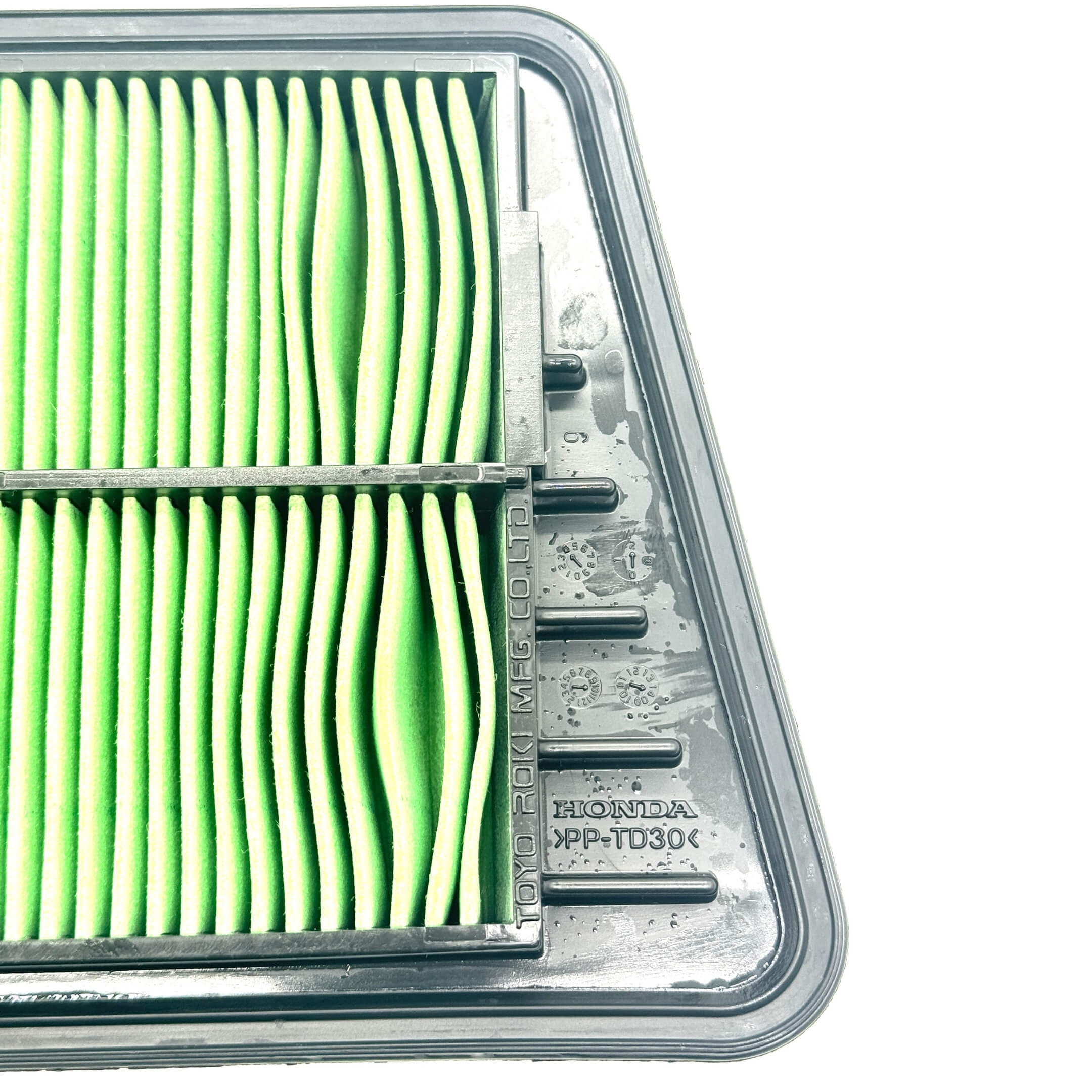 Genuine Honda air filter for Honda Acty Van HH5, HH6 models (1999-2009) featuring a green pleated design.