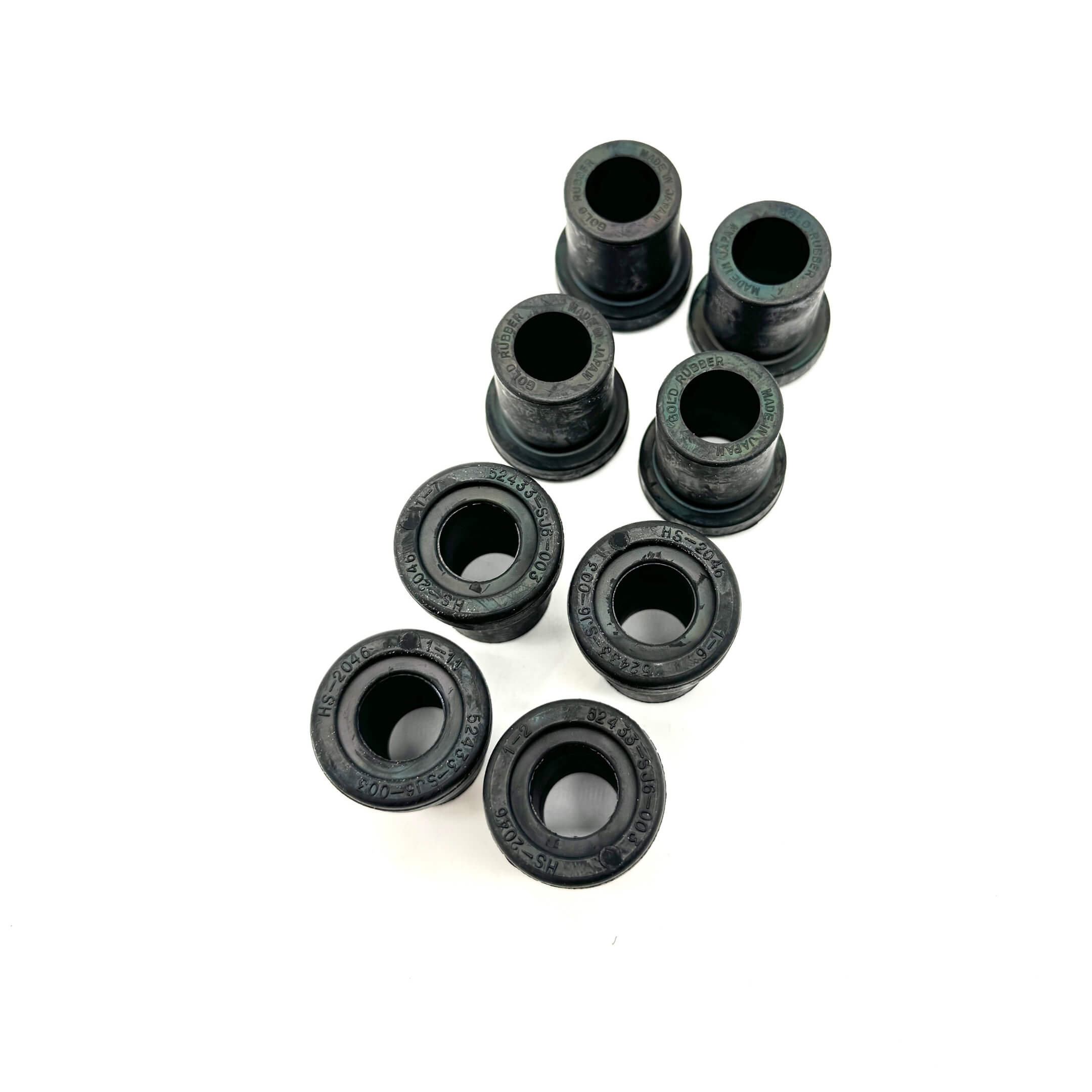 Rear spring shackle bushing set for Honda Acty Truck HA3, HA4 (1990-1999) - 8-piece high-quality rubber bushing set, OEM replacement.