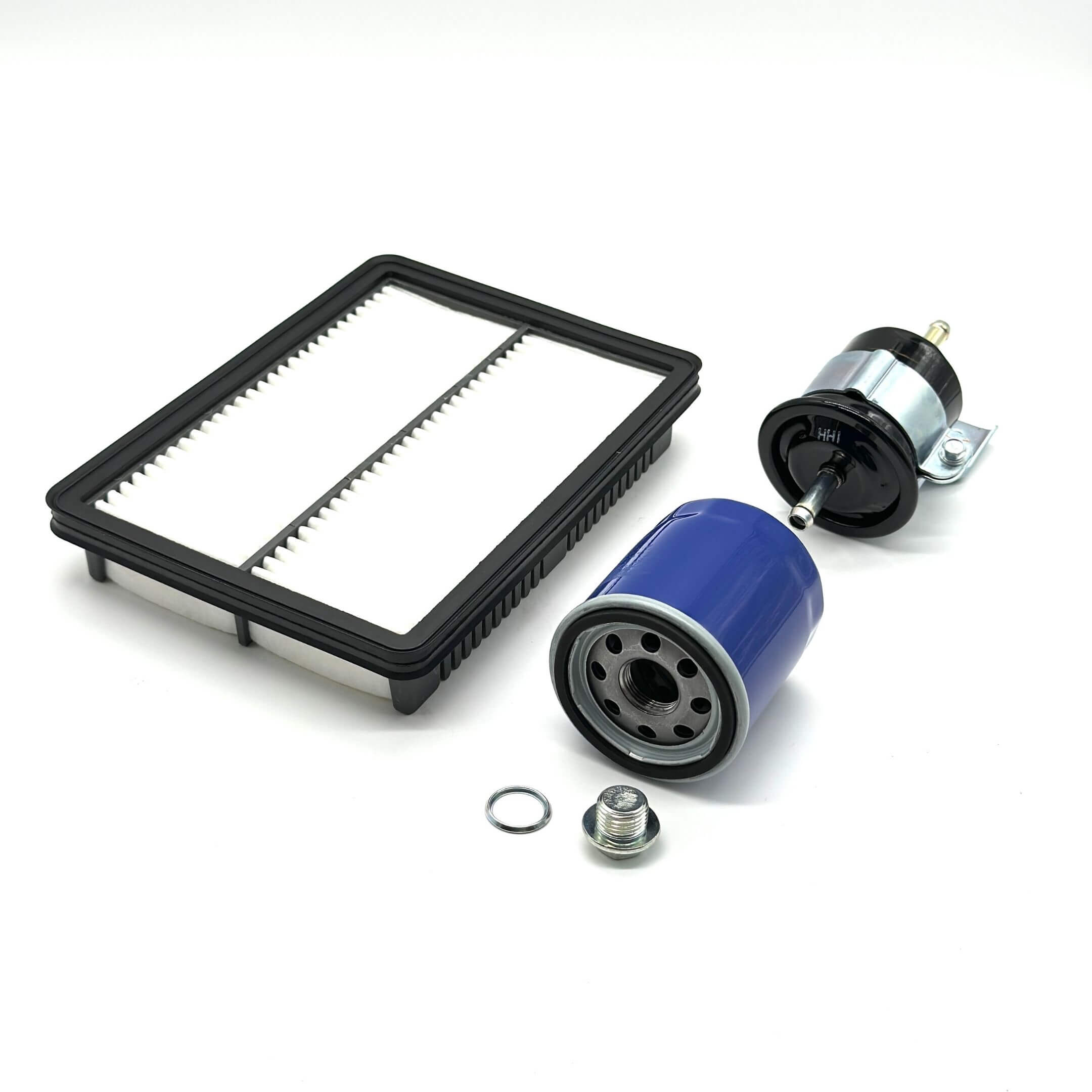 Air Filter, Oil Filter, Fuel Filter Type A, and Drain Plug set for Subaru Sambar Van TV1, TV2 Models 1999-2012, featuring aftermarket and genuine parts with a black and white air filter, blue oil...