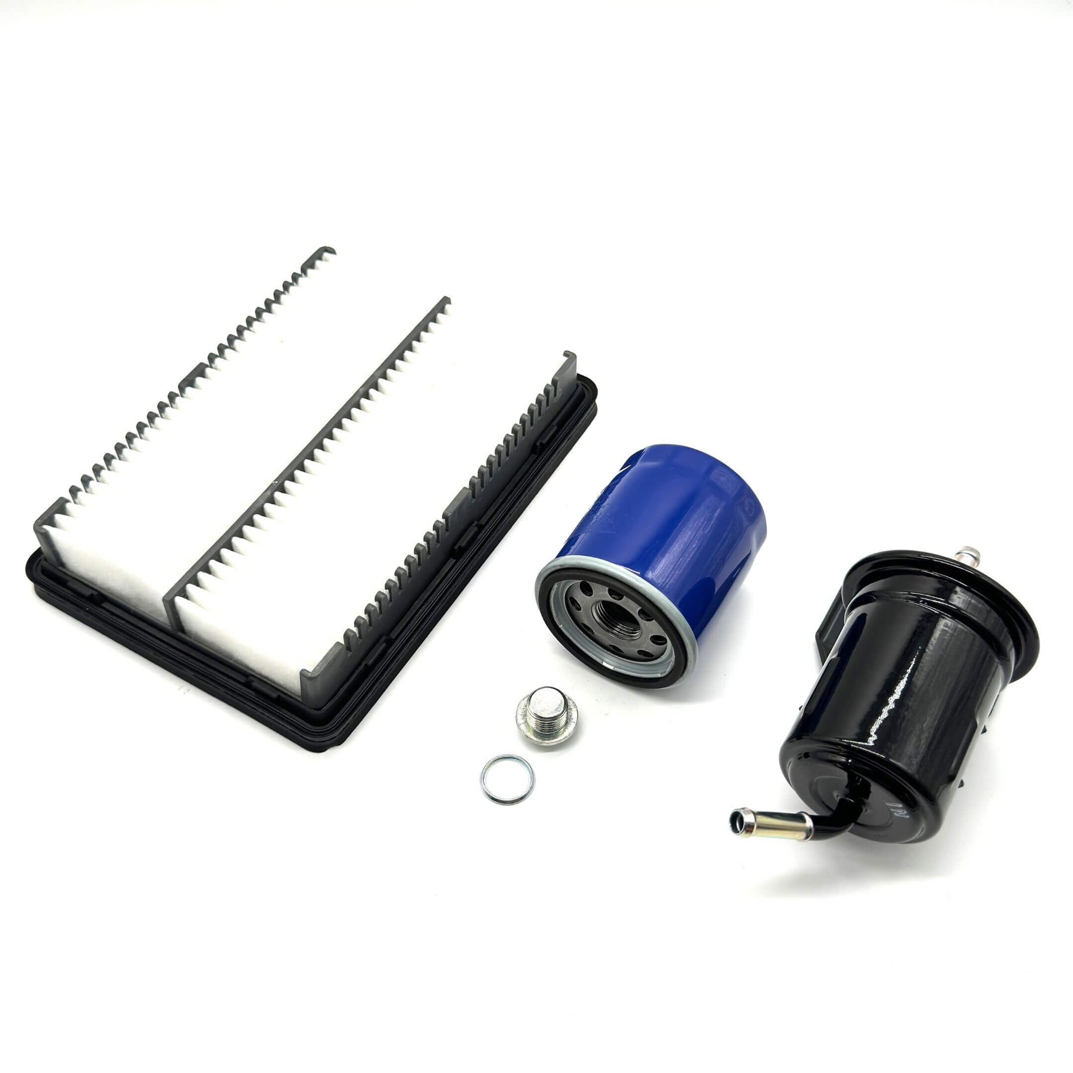 Aftermarket air filter, oil filter, fuel filter (Type B), and drain plug set for Subaru Sambar Van TV1, TV2 models (1999-2012), featuring a white air filter, blue oil filter, and black fuel filter.